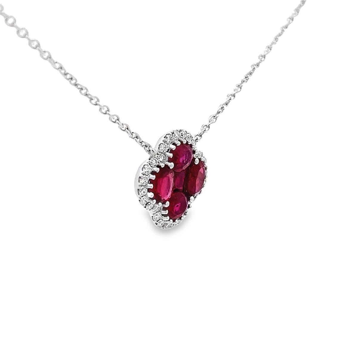Looking for a unique and unforgettable gift? Look no further! This exquisite Ruby flower, accented with a small Diamond Oval& Princess Cut  Shaped, is set in 18k white gold with an adjustable sizing lock and is perfect for any special occasion.