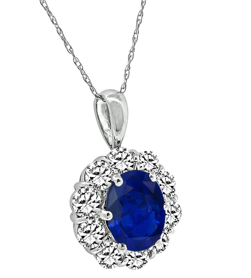 This is an amazing platinum pendant necklace. The pendant is centered with a lovely oval cut sapphire that weighs approximately 2.14ct. The sapphire is accentuated by sparkling round cut diamonds that weigh approximately 1.20ct. The color of these