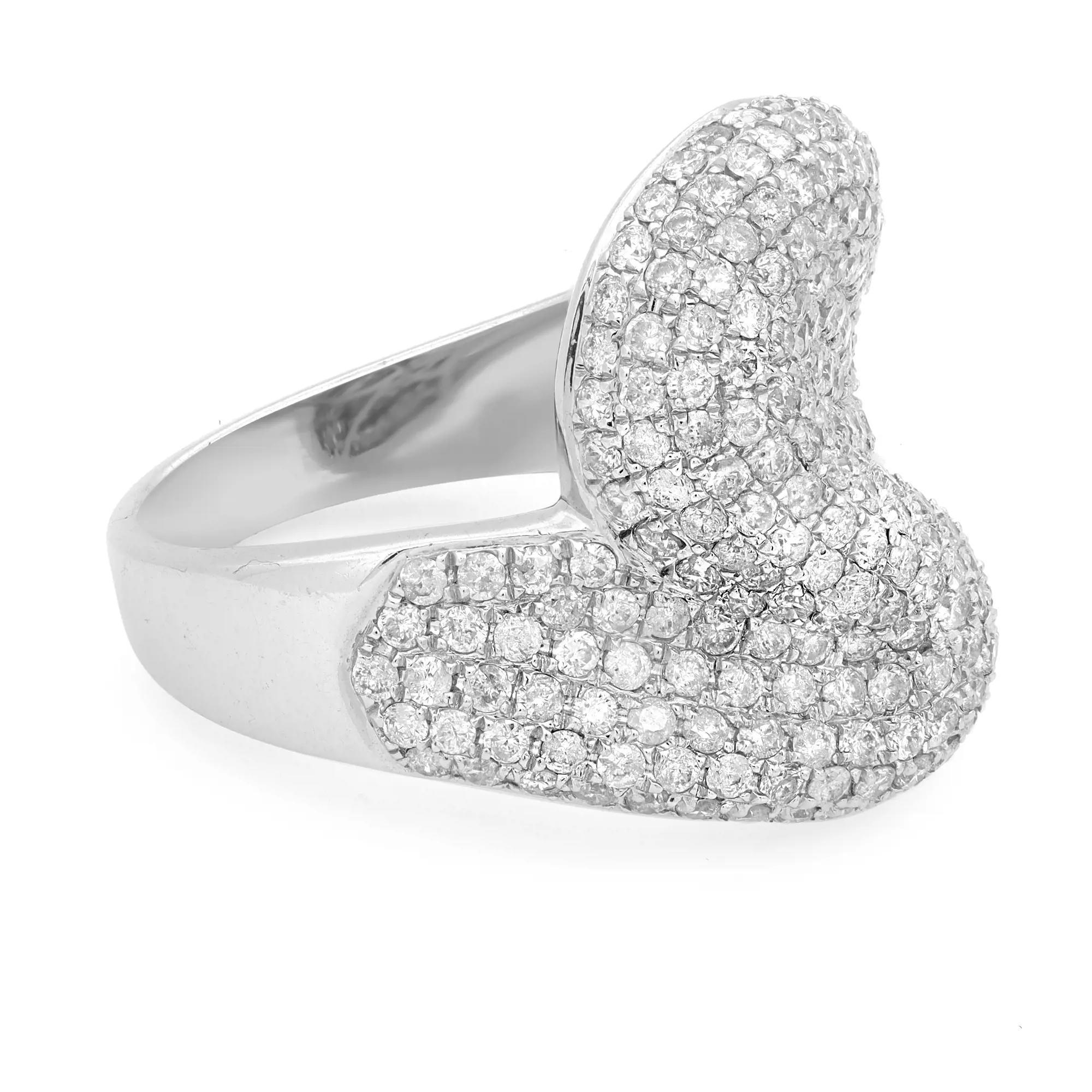This luxurious ladies diamond cocktail ring showcases 2.14 carats of dazzling round cut diamonds in pave setting. Crafted in lustrous 14K white gold. Diamond quality: Color I and clarity SI1. Ring Size: 7.5. Total weight: 7.63 grams. A perfect