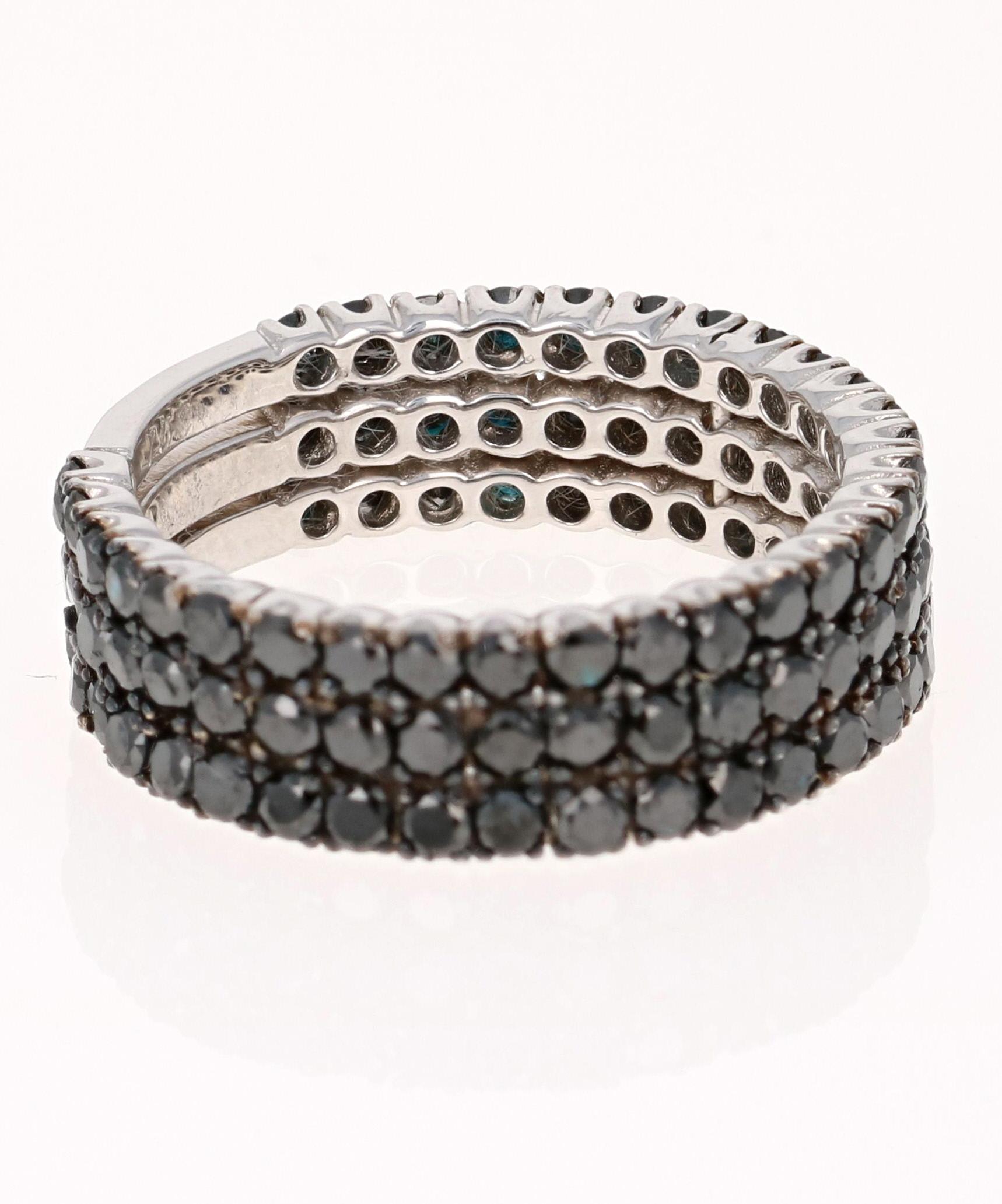This band has Natural Round Cut Black Diamonds that weigh 2.15 Carats. It is crafted in 14 Karat White Gold and weighs approximately 4.0 grams. 

The ring is a size 6 1/2 and can be re-sized, upon request, free of charge. 
