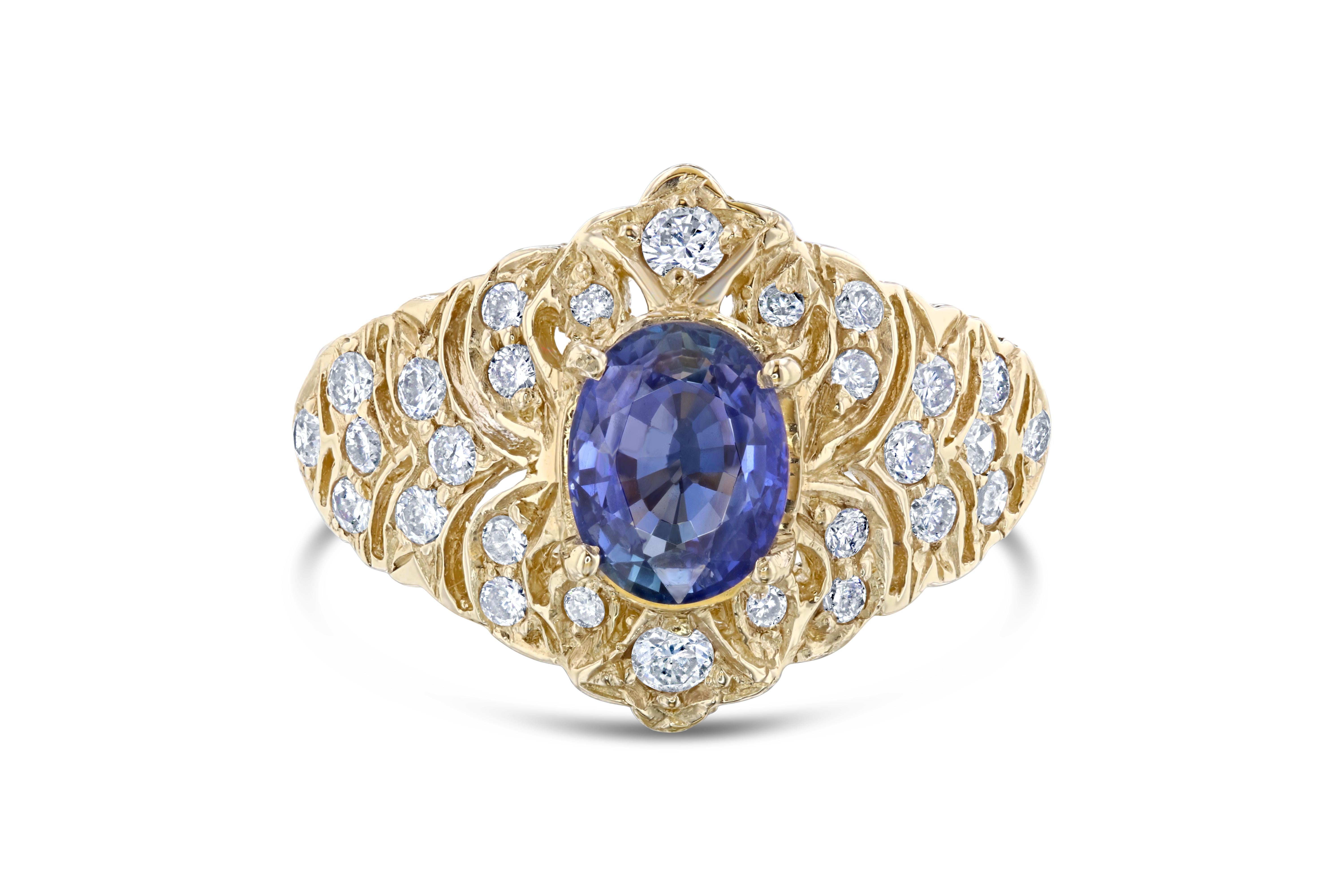 This unique ring is a Vintage-Inspired ring. It's beauty derives from the stunning Blue Sapphire that weighs 1.58 Carats and is adorned by 28 Round Cut Diamonds weighing 0.57 Carats. The total carat weight is 2.15 Carats. 

The Oval Cut Sapphire is