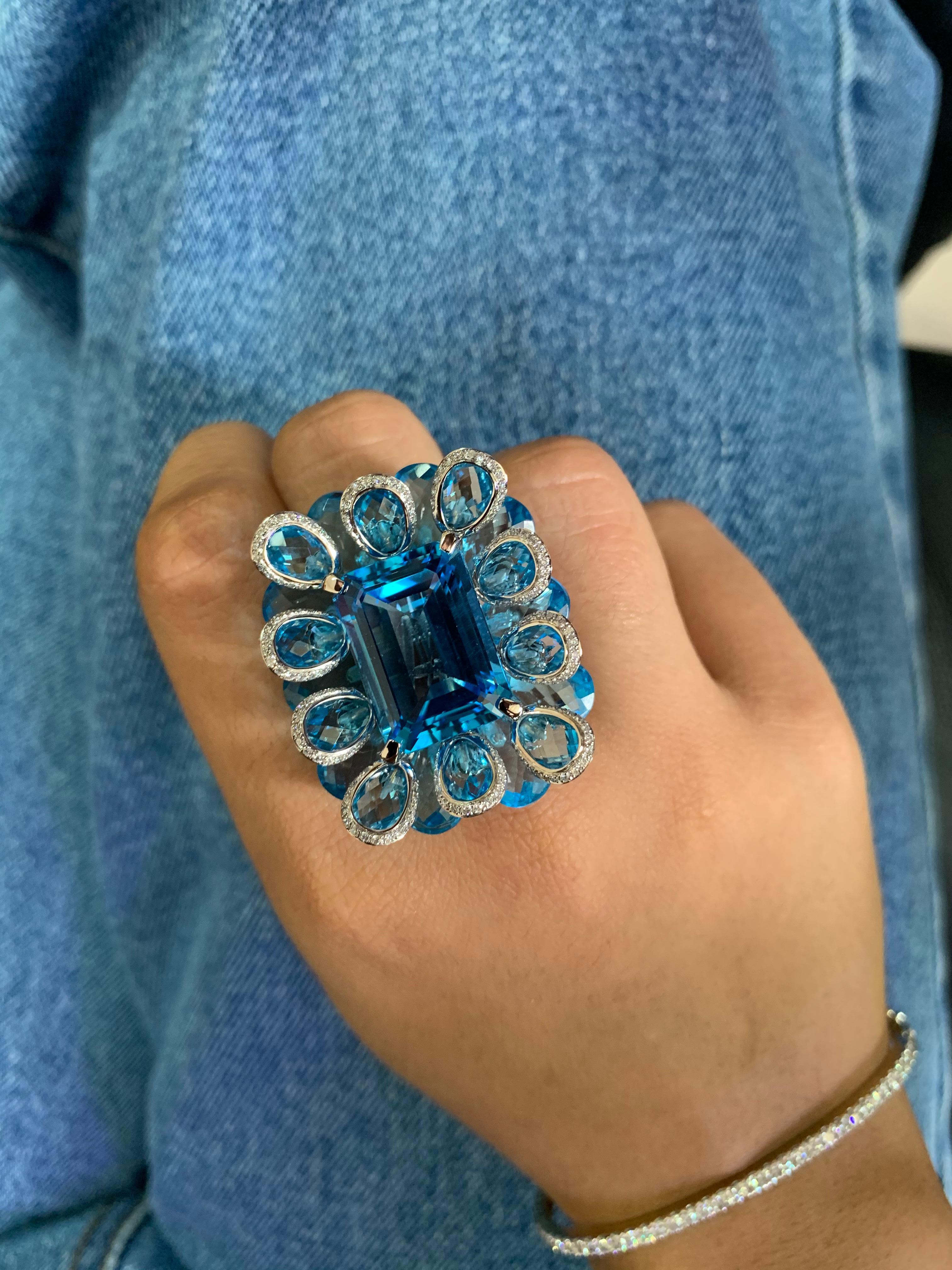 Modern 21.5 Carat Blue Topaz and Diamond Floral Ring in 18 Karat White Gold For Sale