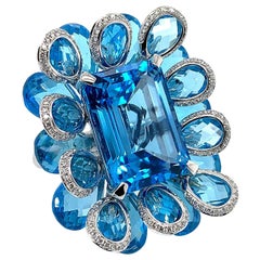 21.5 Carat Blue Topaz and Diamond Floral Ring in 18 Karat White Gold