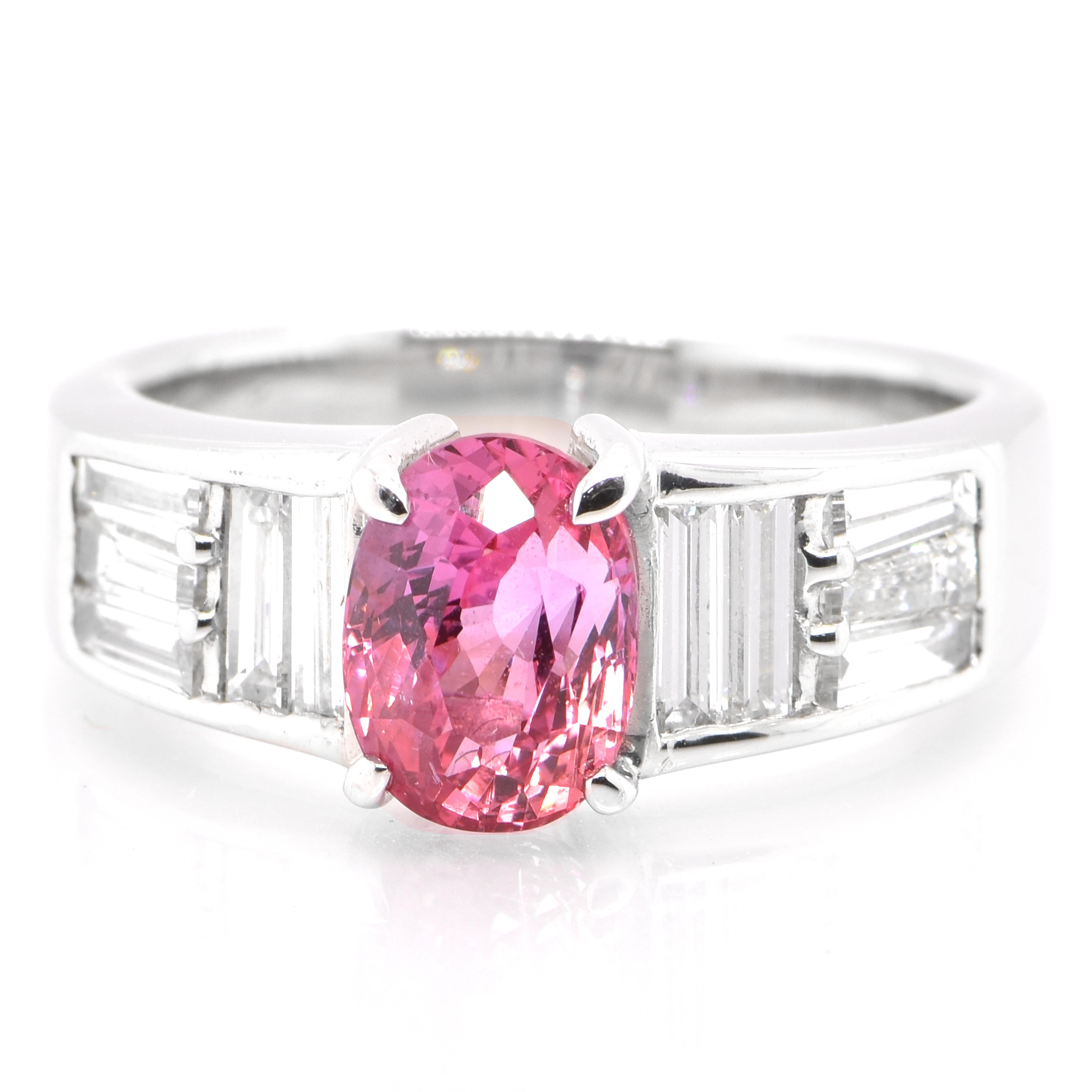 An elegant ring with a 2.15 Carat, Natural Pink Sapphire and 0.84 Carats of Diamond Accents set in Platinum. Sapphires have extraordinary durability - they excel in hardness as well as toughness and durability making them very popular in jewelry.