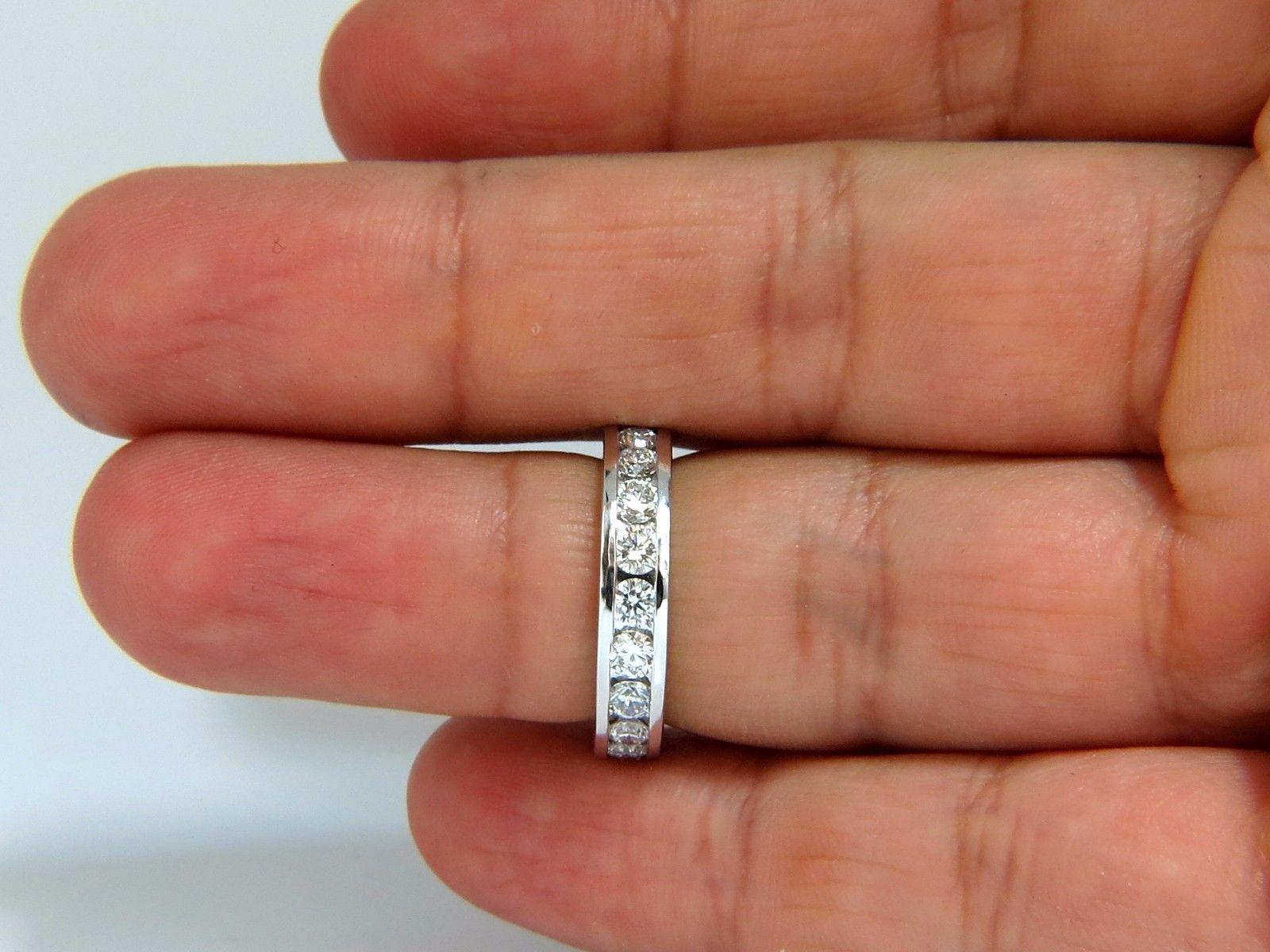 2.15ct. Diamonds eternity band 
Round, Brilliant Cuts

G color 

Vs-2 clarity


Channel Set

5.5 grams

20 diamond count
Size 6 and may not resize.


4.4mm thick

2.6mm depth


Platinum

 $8000 Appraisal to accompany