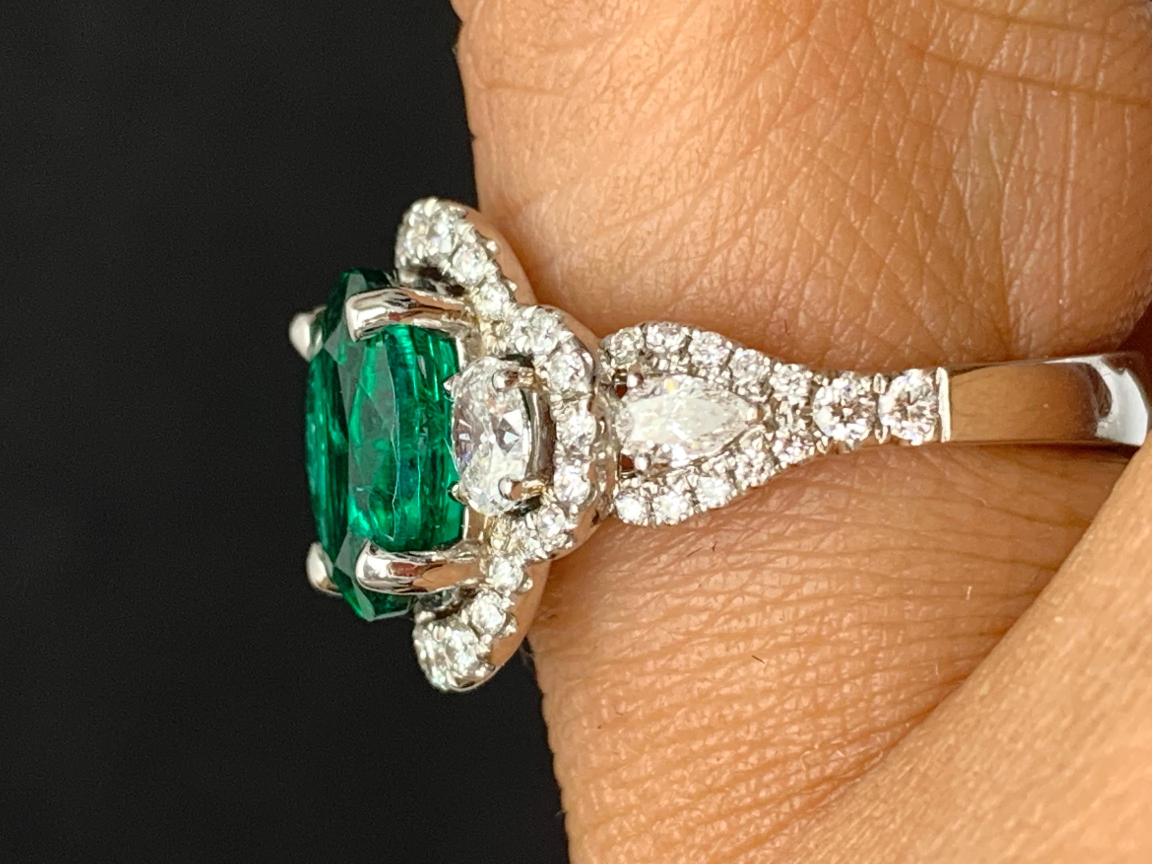 2.15 Carat Oval Cut Emerald and Diamond Halo Ring in 18K White Gold For Sale 5