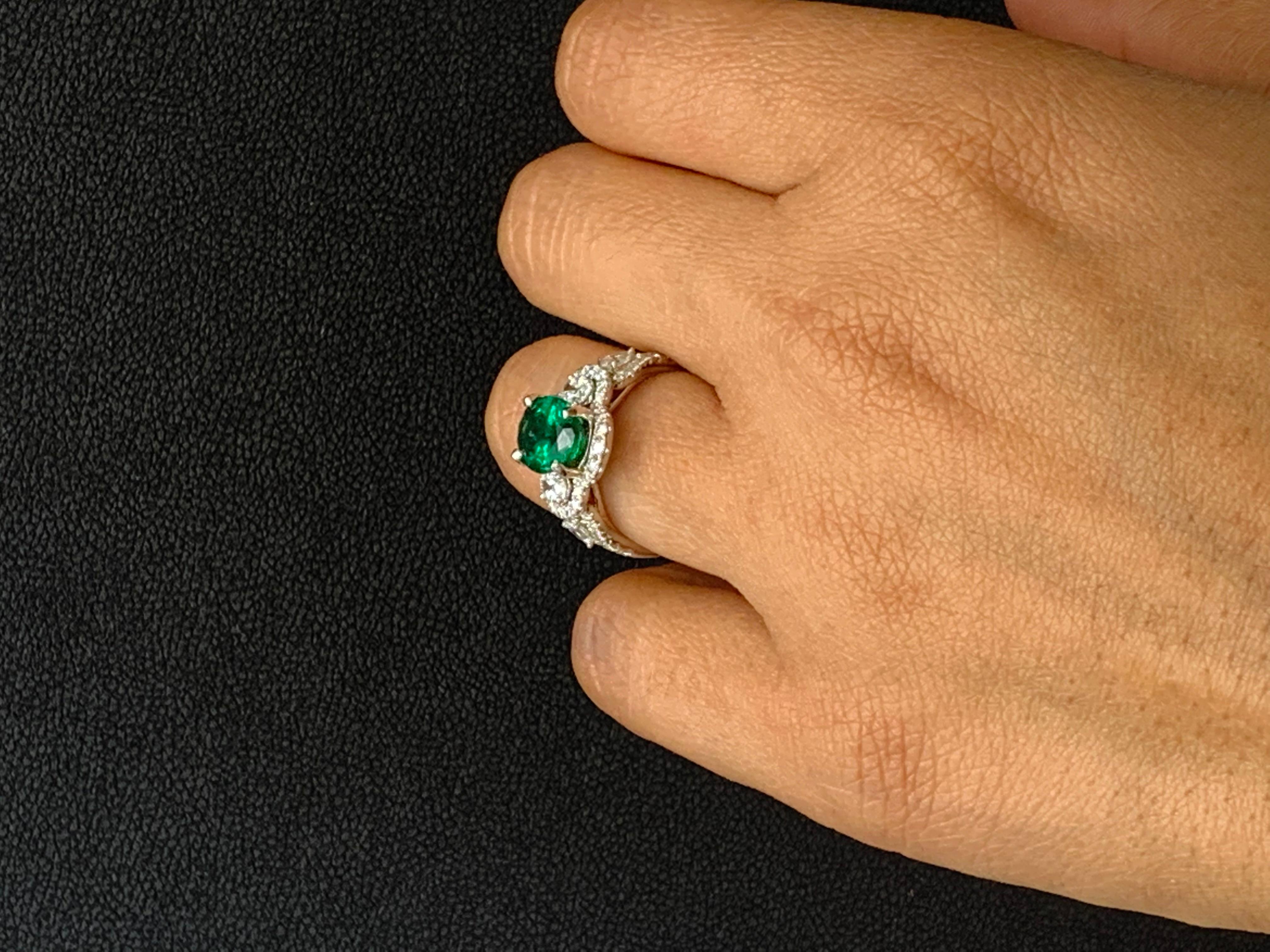 2.15 Carat Oval Cut Emerald and Diamond Halo Ring in 18K White Gold For Sale 9