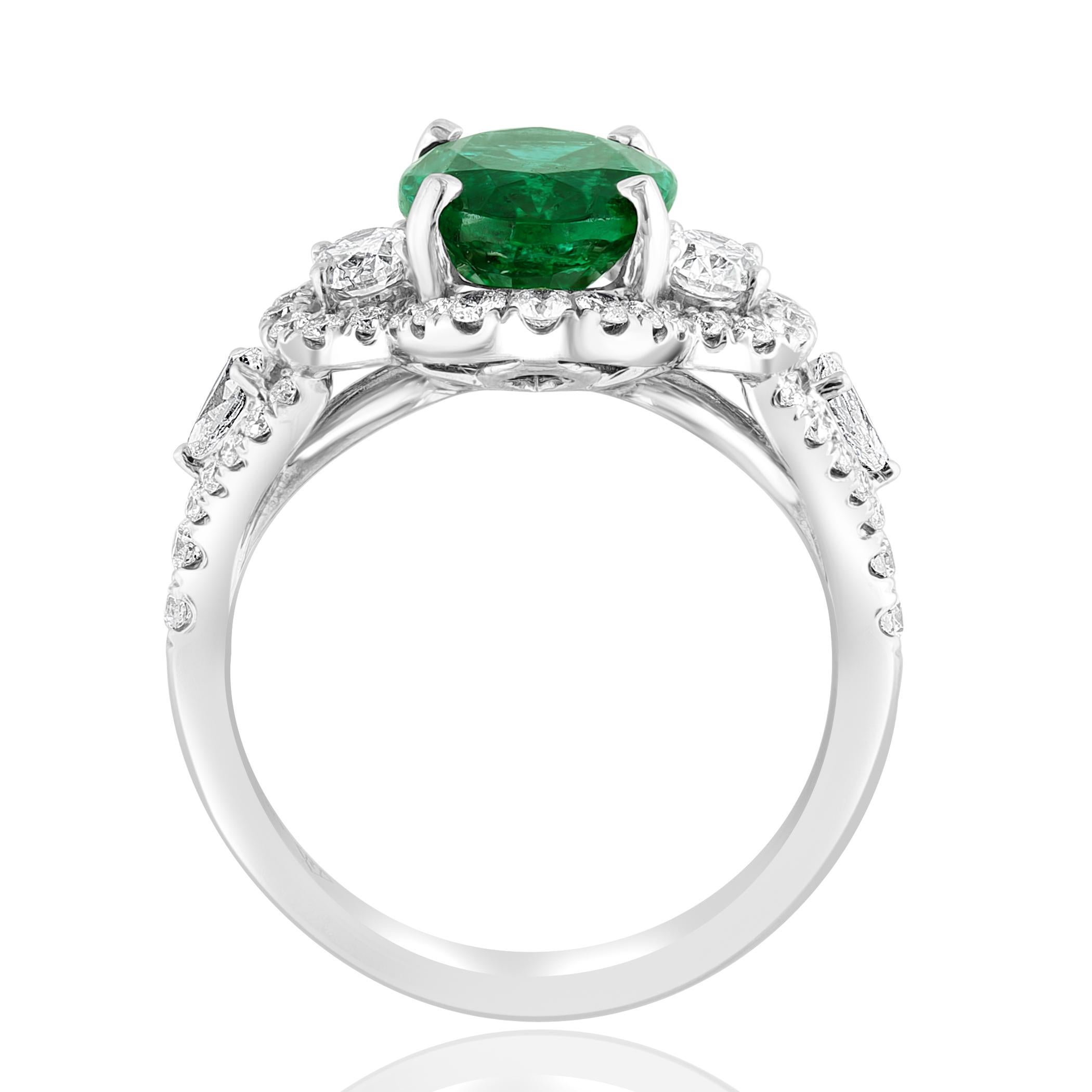 Modern 2.15 Carat Oval Cut Emerald and Diamond Halo Ring in 18K White Gold For Sale