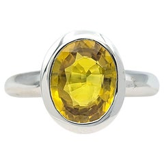 2.15 Carat Oval Cut Yellow Sapphire Solitaire Ring in 18 Karat White Gold