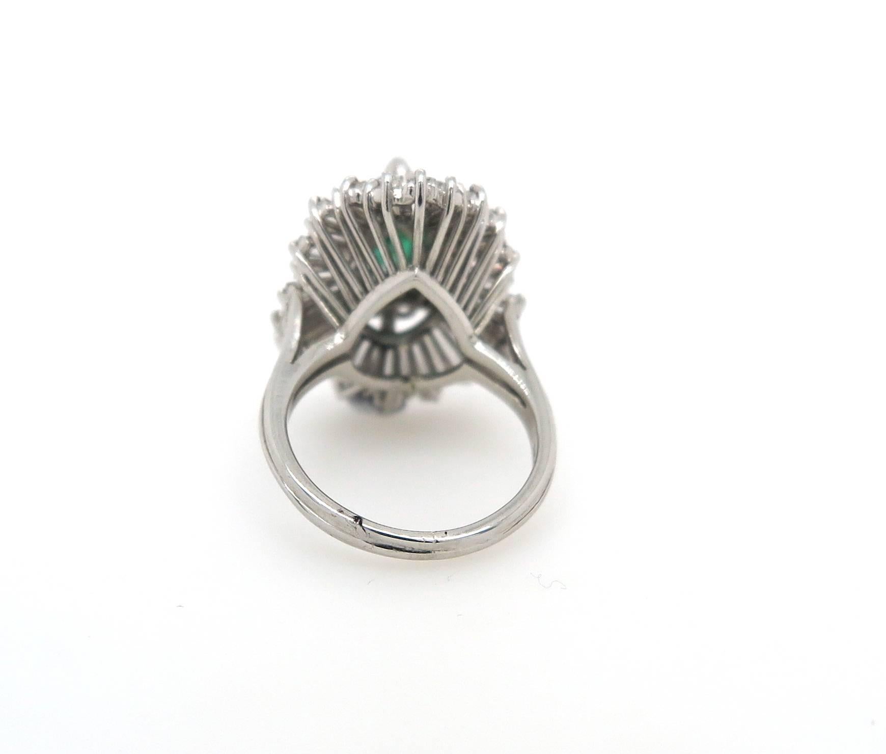 Modern 2.15 Carat Pear Shaped Colombian Emerald and 3.95 Carat Diamond Cocktail Ring For Sale