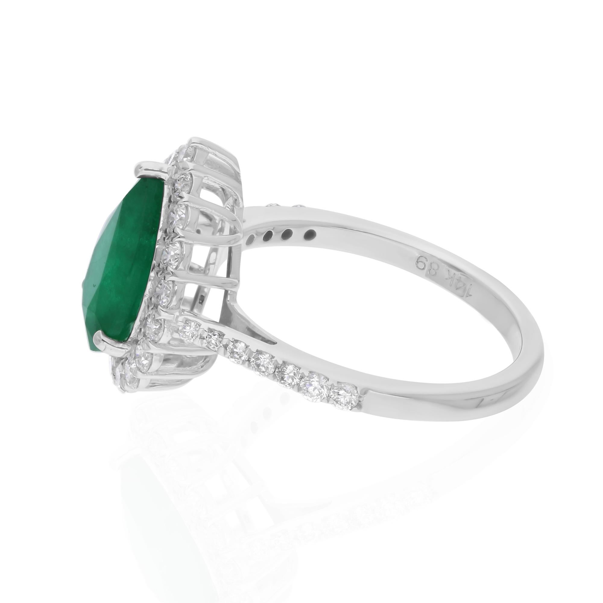 Cast from 14-karat gold, these exquisite ring is handset with 2.15 carats Zambian emerald and 0.65 carats of sparkling diamonds.

The ring is a size 7 US and may be resized to larger or smaller upon request. FOLLOW SPECTRUM JEWELS storefront to view