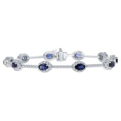 Bracciale con zaffiri blu ovali e diamanti da 2,15 carati di peso totale, oro 14k
