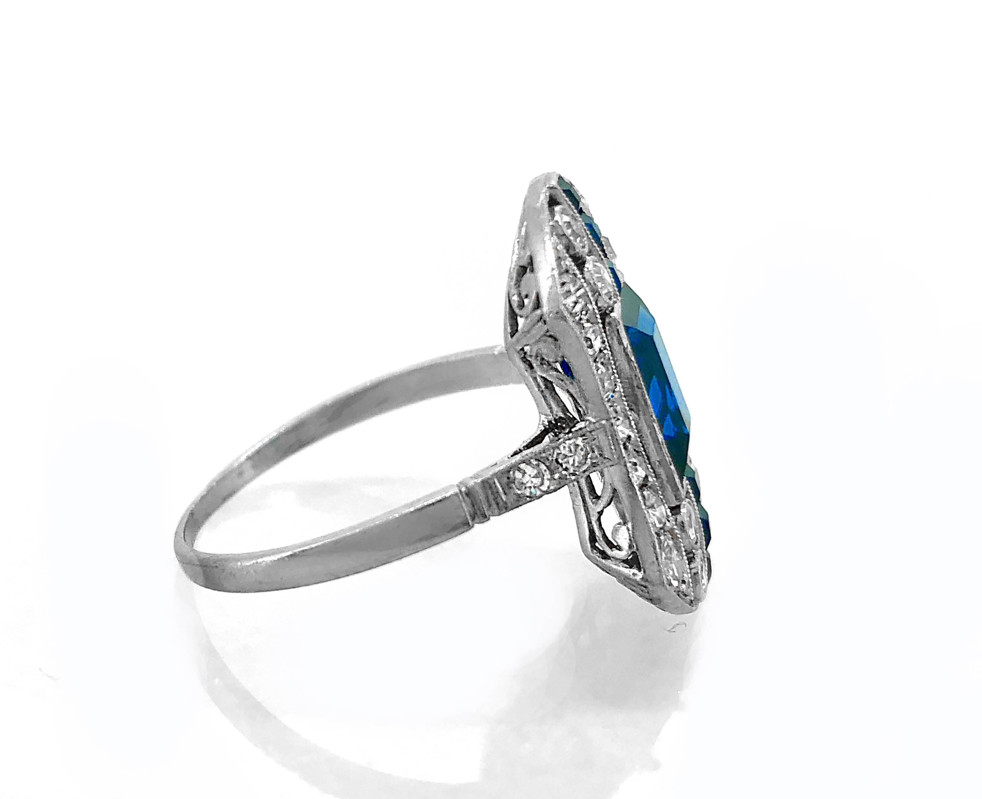 This is a fantastic Art Deco sapphire and diamond Antique Engagement or Fashion ring which features a vivid blue eye clean sapphire weighing 1.75ct. apx. which is unheated and natural. The mounting, which is crafted in period platinum, features a