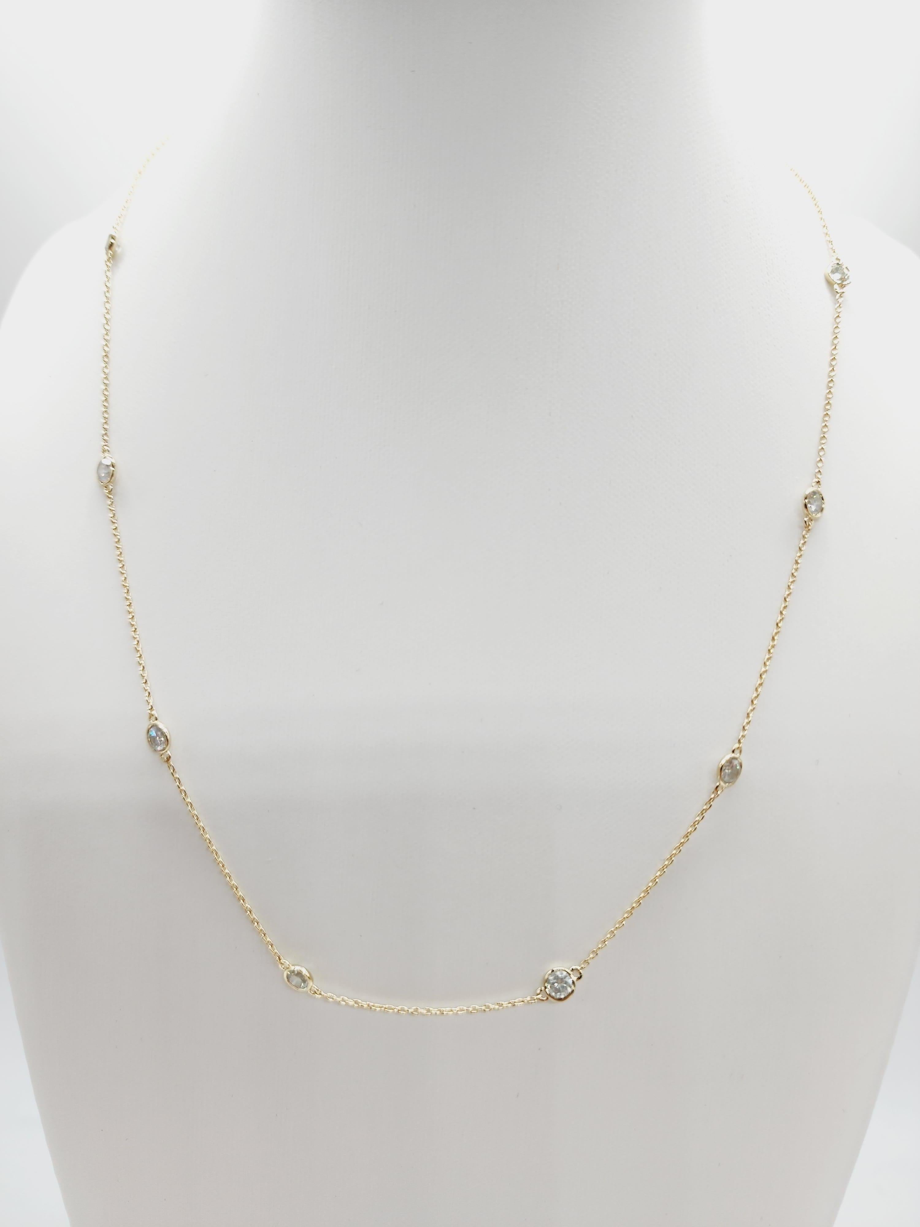 10 Station Diamond by the yard necklace set in Italian made 14K yellow gold. 

Total carat weight: 2.15 cts
Beautiful shiny stones 
Necklace length: 18 inch 
Color: H
Clarity Range: SI-I
Weight: 5.21 Grams
