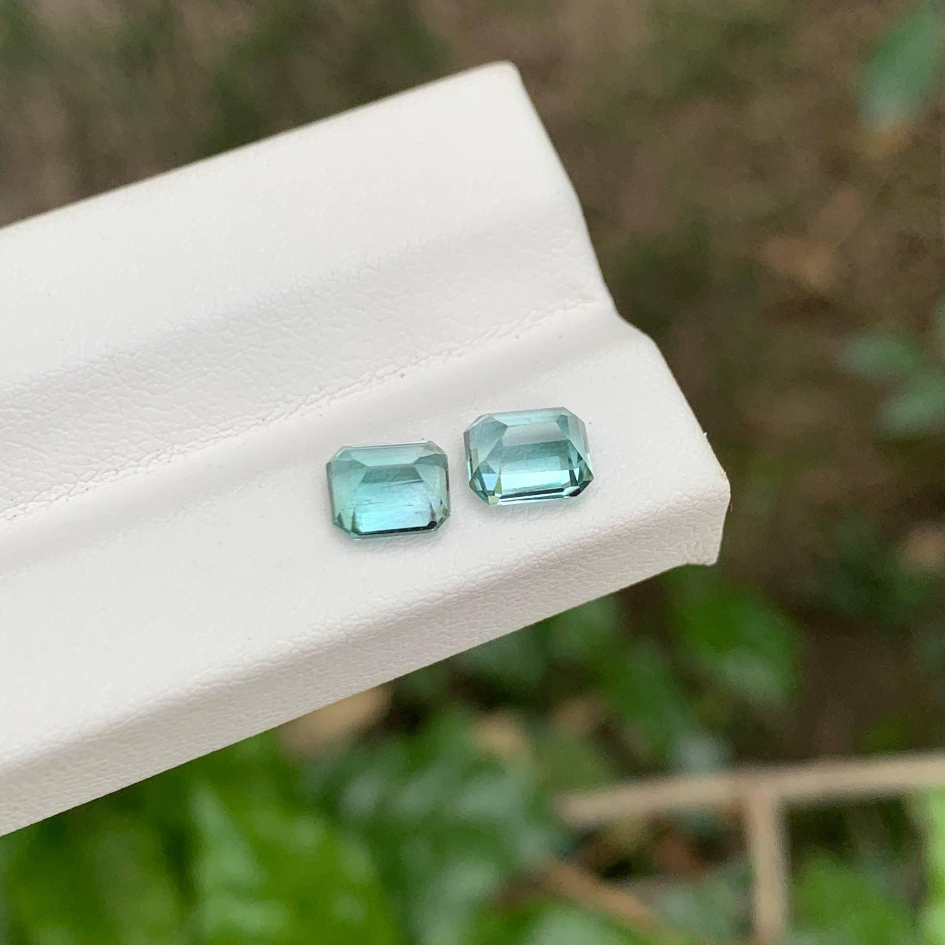 Weight  1.05 and 1.10 carat 
Total 2.15 carats
Dimensions 6.3x5x4.5mm
Treatment None 
Origin Afghan
Clarity  Eye Clean
Shape Octagon
Cut Emerald
NA


This exquisite 2.15 carat pair of bluish Paraiba tourmalines showcases the rare beauty and