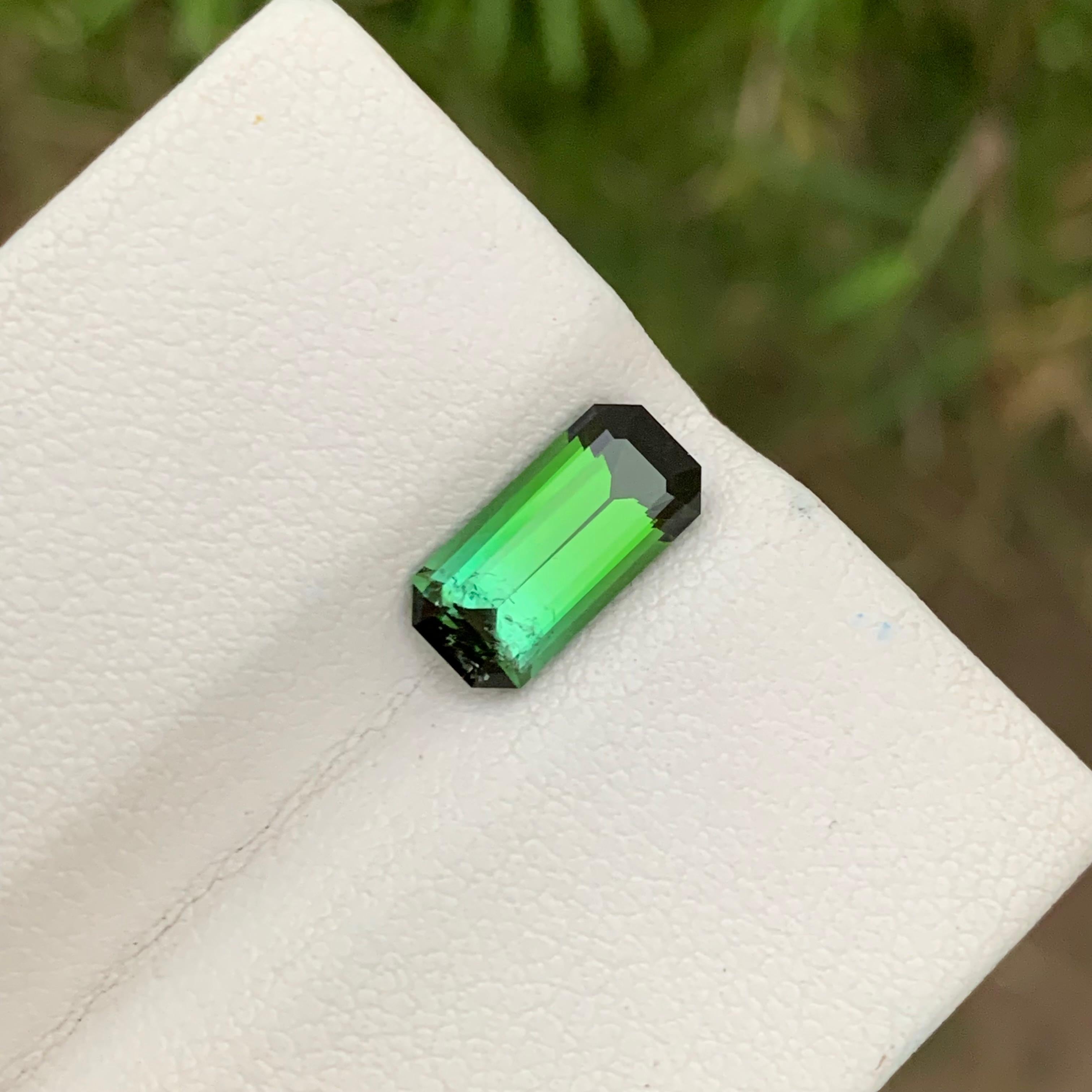 Loose Tourmaline 
Weight: 2.55 Carats 
Dimension: 11.3x5.4x4.2 Mm
Origin: Afghanistan 
Shape: Emerald 
Color: Blue Green (Bicolor)
Treatment: Non
Certificate: On Client Demand 
Bicolor tourmaline is a captivating variety of the colorful gemstone