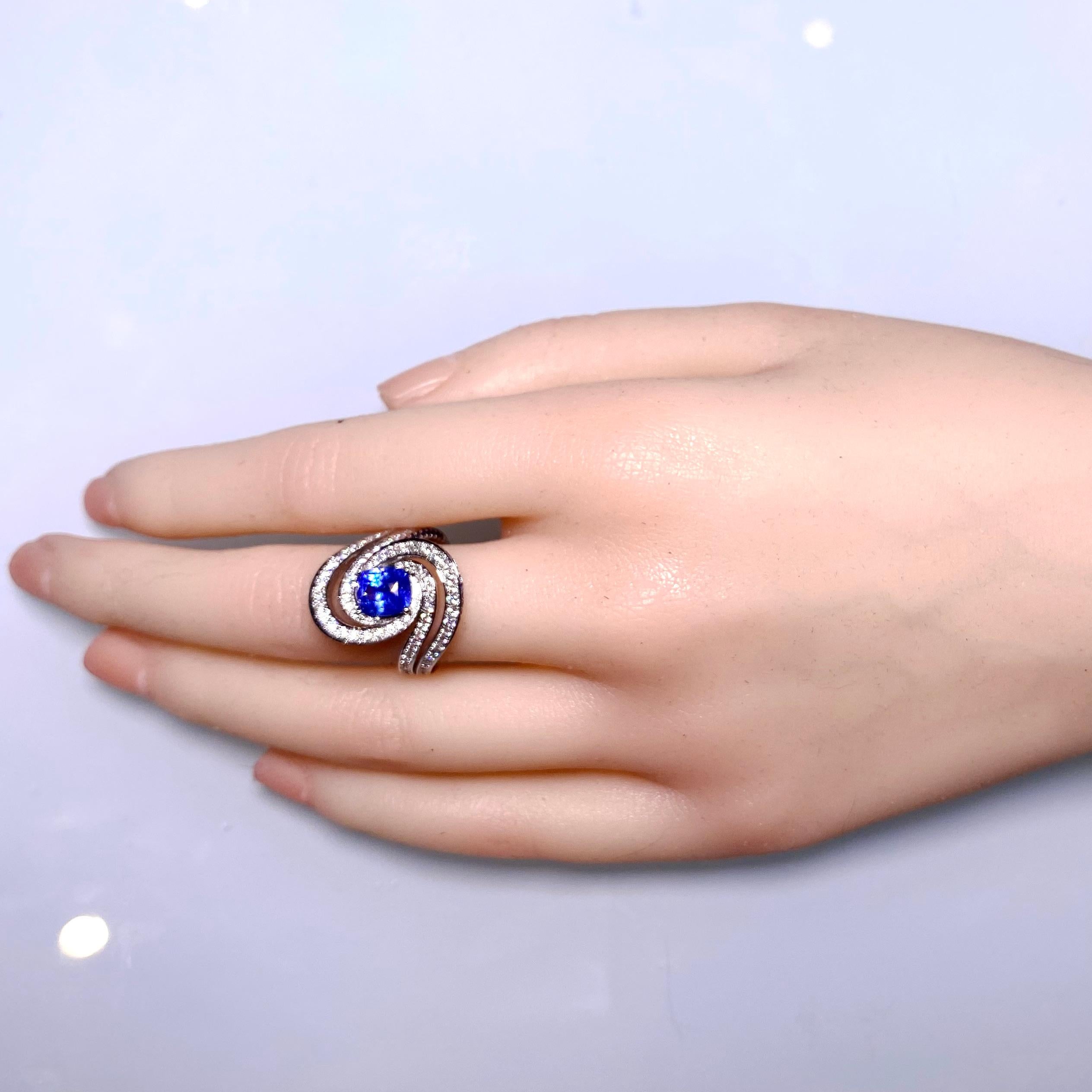 Contemporary Eostre Vivid Blue Sapphire and Diamond Ring in 18K White Gold For Sale