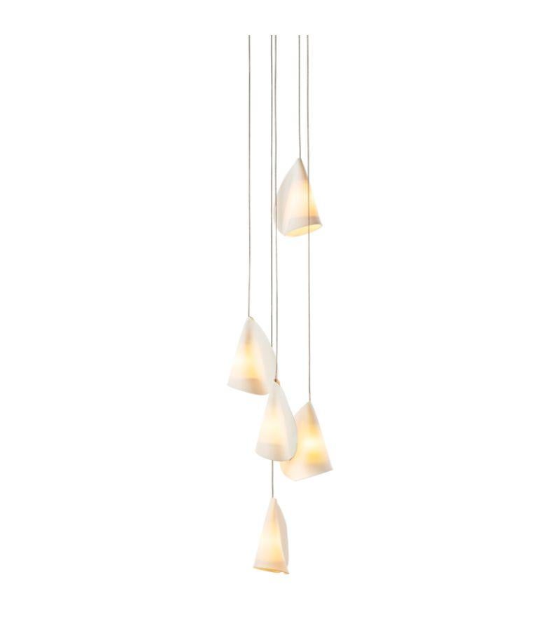 21.5 Porcelain chandelier lamp by Bocci
Dimensions: Diameter 15.2 x Height 300 cm 
Materials: Porcelain, borosilicate glass, braided metal coaxial cable, electrical components, brushed nickel canopy. 
Lamping: 1.5w LED or 20w xenon. Nondimmable.