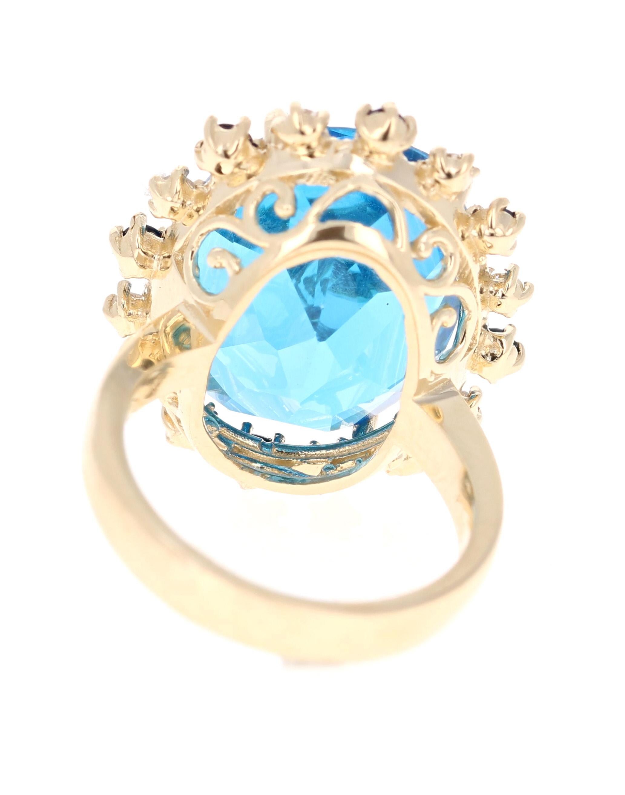 Oval Cut 21.50 Carat Blue Topaz Diamond Yellow Gold Cocktail Ring For Sale