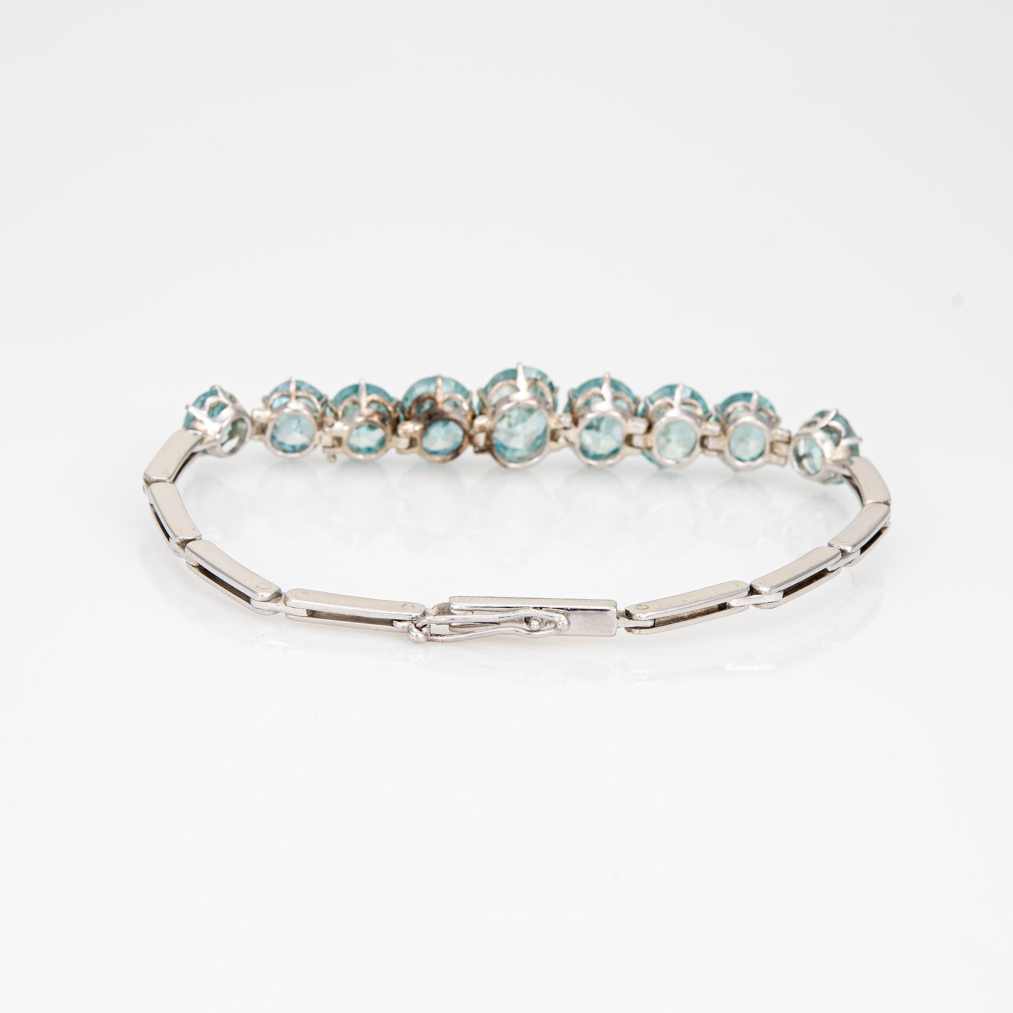 Finely detailed vintage blue zircon bracelet (circa 1920s to 1930s), crafted in 14 karat white gold. 

Faceted oval cut blue zircons range in size from 1.50 to 3.50 carats. The zircons are in very good condition and free of cracks or chips.  

The