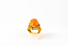 21.52 Carat Cabochon Pink Coral White Diamond Yellow Gold Dragons Cocktail Ring