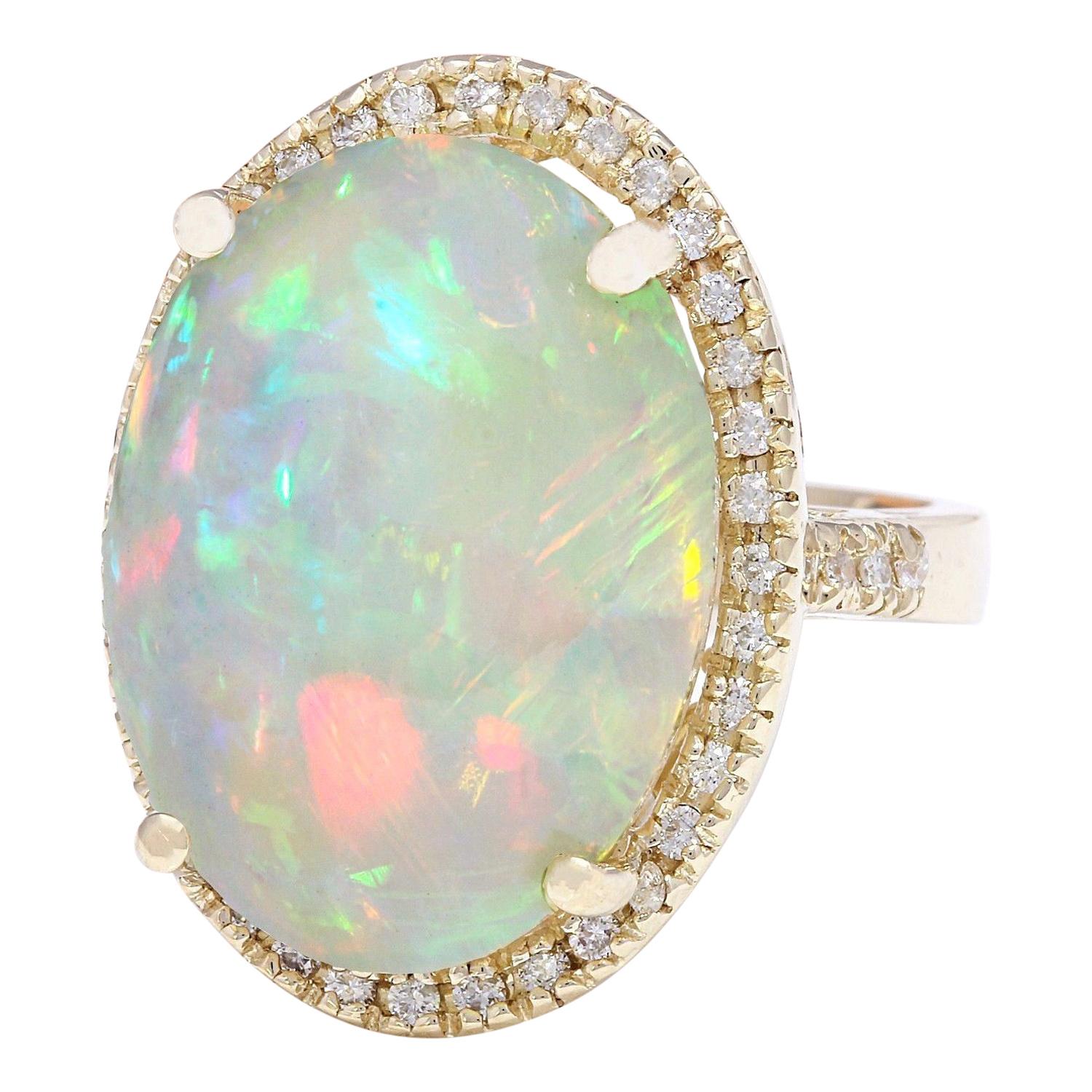 21.58 Carat Natural Opal 14K Solid Yellow Gold Diamond Ring
 Item Type: Ring
 Item Style: Cocktail
 Material: 14K Yellow Gold
 Mainstone: Opal
 Stone Color: Multicolor
 Stone Weight: 21.08 Carat
 Stone Shape: Oval
 Stone Quantity: 1
 Stone
