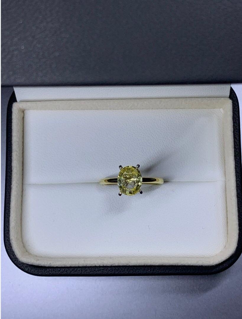 2.15ct Sapphire oval shaped solitaire engagement ring in 18ct yellow gold
2.15ct Yellow sapphire engagement ring in 18ct yellow gold.

Beautiful yellow vivid sapphire oval cut gemstone natural untreated engagement ring total weight of the gemstone