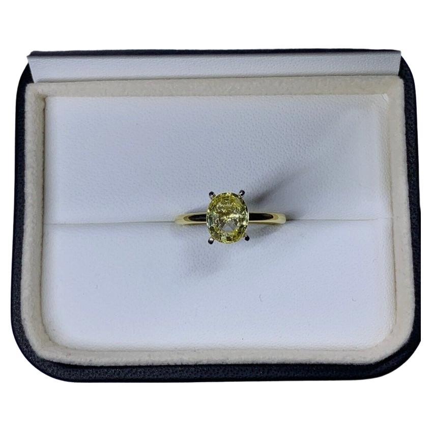 2.15ct Sapphire oval shaped solitaire engagement ring in 18ct yellow gold For Sale