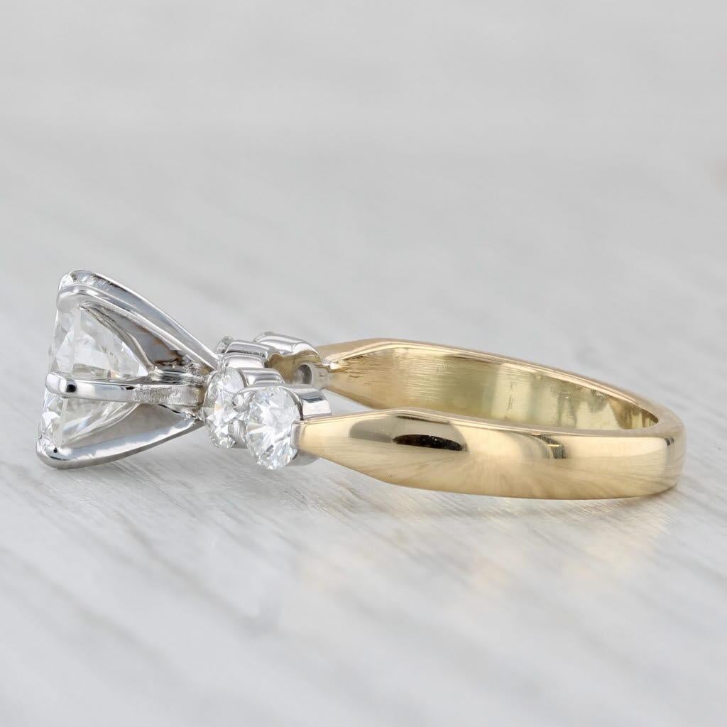 Gemstone Information:
- Natural Diamond - center
Carats - 1.55ct 
Cut - Round Brilliant
Color - G
Clarity - SI1
GIA - 5234411524 

- Natural Diamonds - accents
Total Carats - 0.70ctw
Cut - Round Brilliant
Color - F - G
Clarity - VS2 - SI1

Metal: