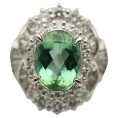 Anello in platino con diamante e tormalina menta da 2,16 carati