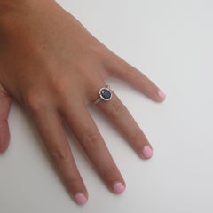 2.16 Carat Oval Blue Sapphire and .24 Carat Diamonds 18 Karat Yellow Gold Ring