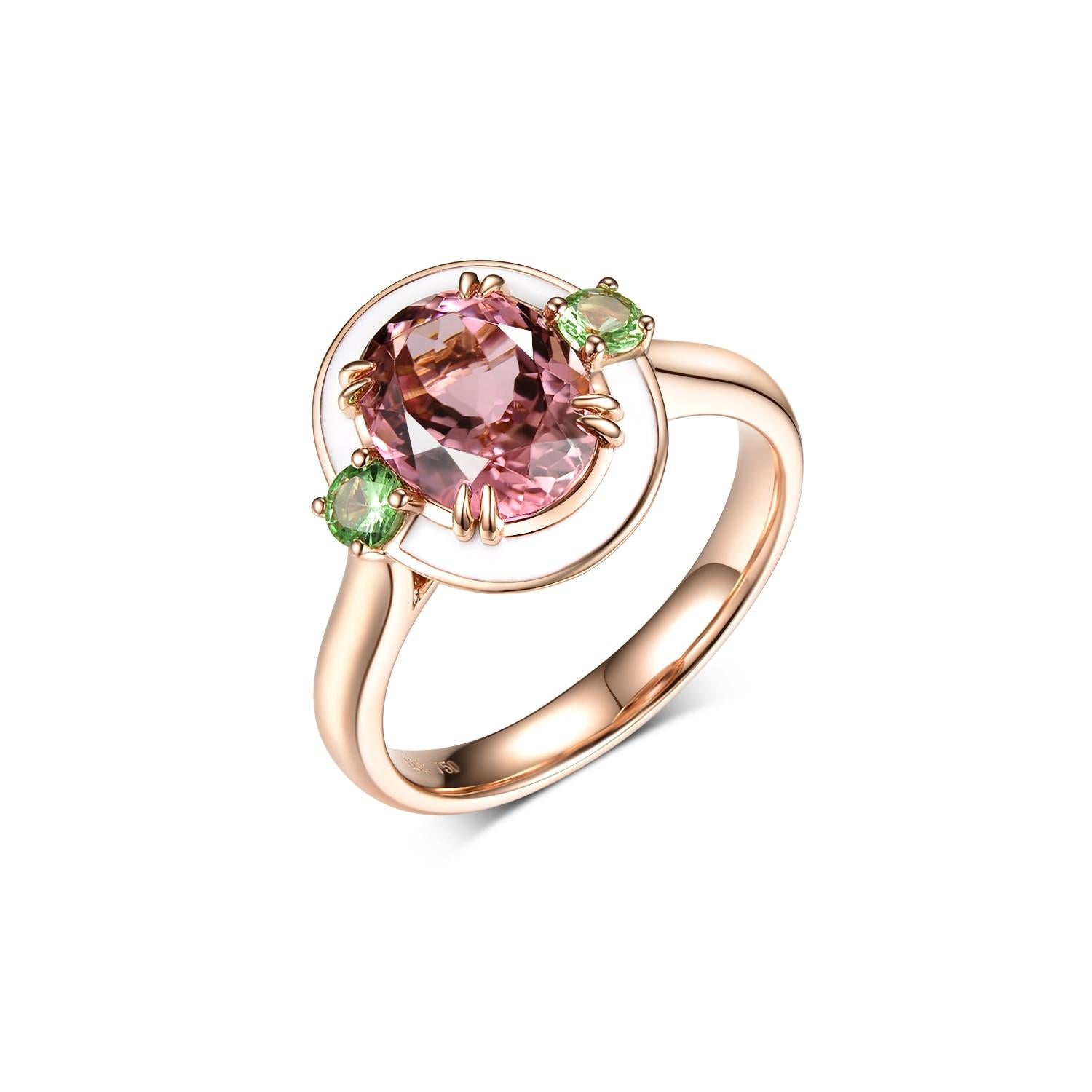 Evoke timeless elegance with this stunning ring, showcasing a radiant 2.16-carat oval cut pink tourmaline at its heart. This captivating gemstone, known for its vibrant hue and rich history, is securely held by double claws on each of its corners,