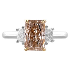 2.16 cts GIA Certified Fancy Pinkish Brown Radiant Three-stone Diamond Ring