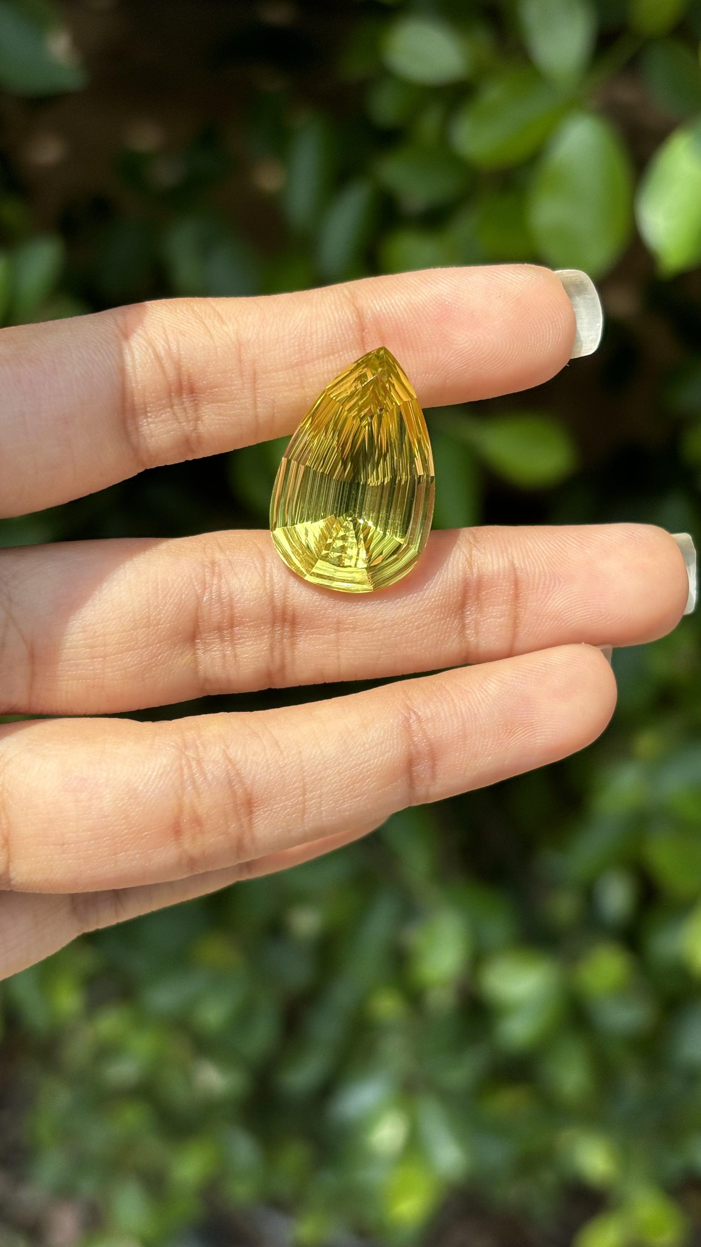 A 21.60 Carat Citrine gemstone, resplendent in hues of vivid yellowish-orange. The Citrine is cut to perfection in a pear shape.

Citrine has been cherished since the ancient times. The Romans used it for beautiful jewelry and intaglio work, while