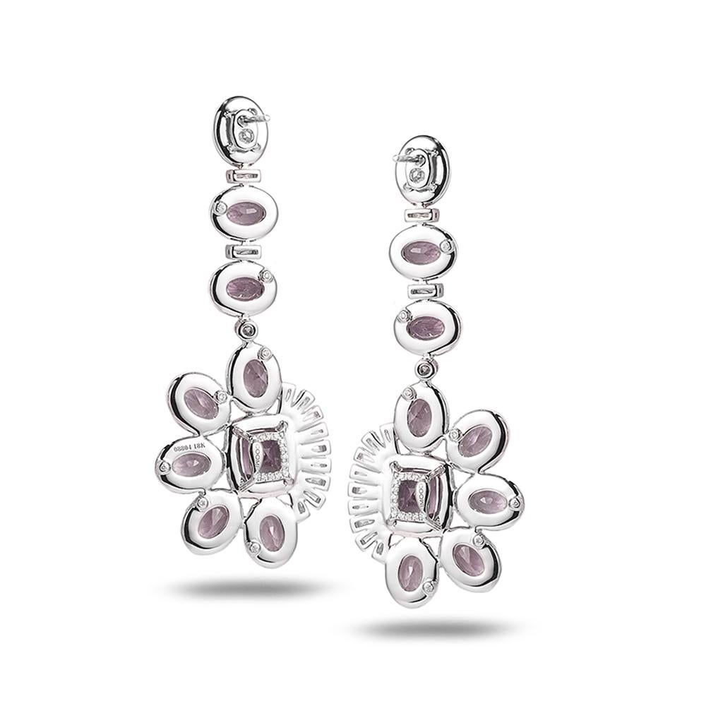 Flawless Pink Spinel and Diamond Drop Earrings Set in 18 karat White Gold with 21.60-carat Spinels and 3.62-carat White Diamonds. These earrings are part of the Trinity Collection which is influenced by the peace and harmony found on the banks of