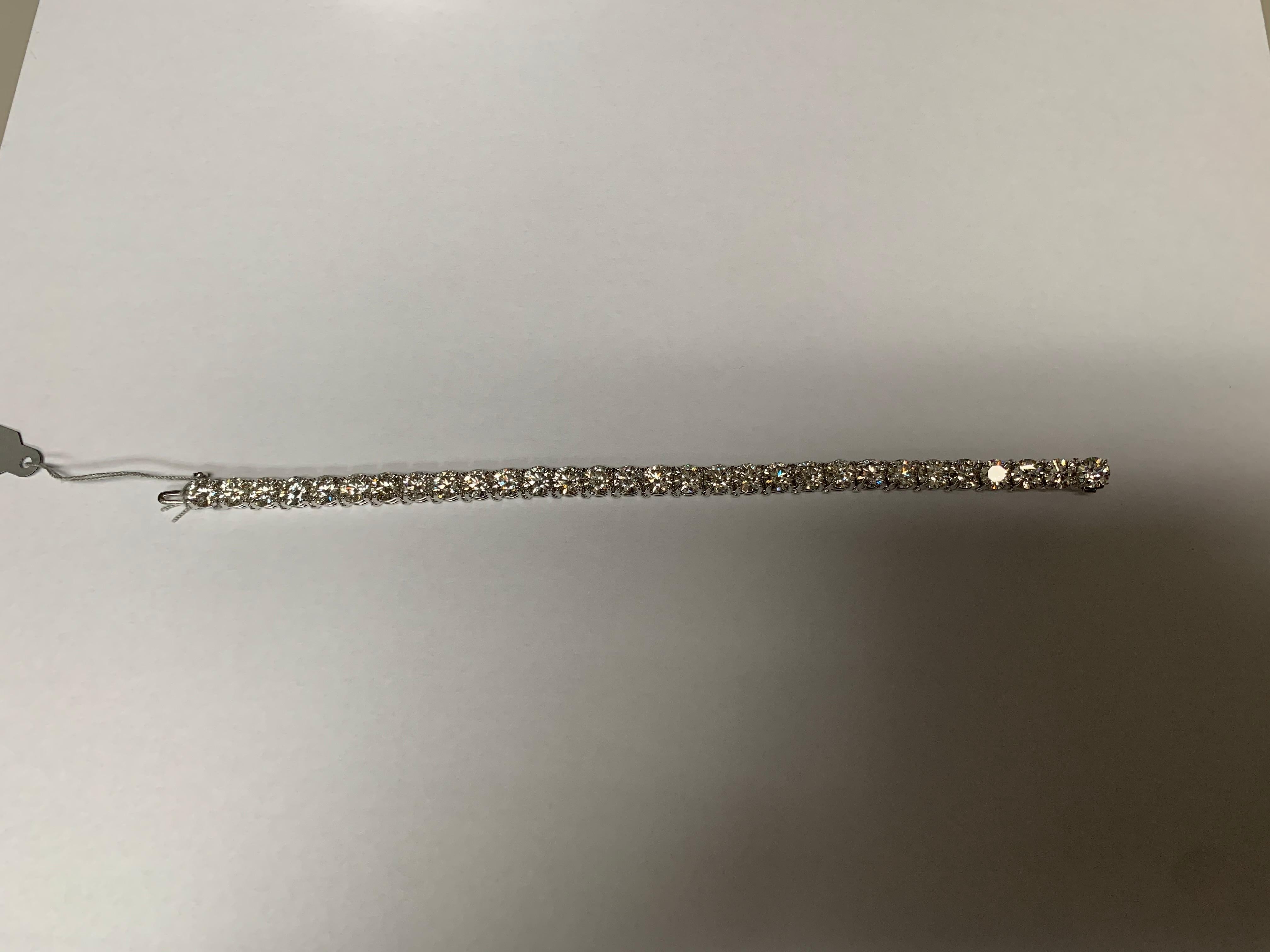 30 Round Brilliant Cut Diamonds are set in Tennis Bracelet.
Diamonds are Not Certified but Estimated to be H - I in Color and SI Type in Clarity.
