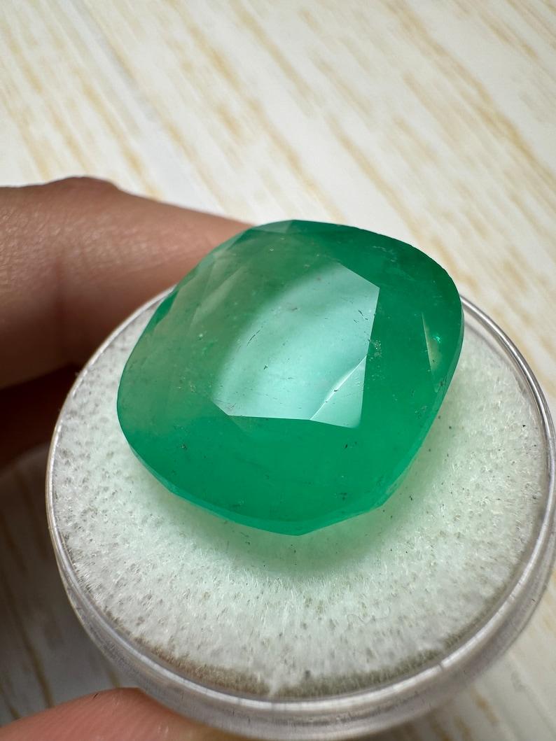 Modern 21.62 Carat Earthy Green Colombian Emerald - 19x17 Cushion Cut May Birthstone For Sale