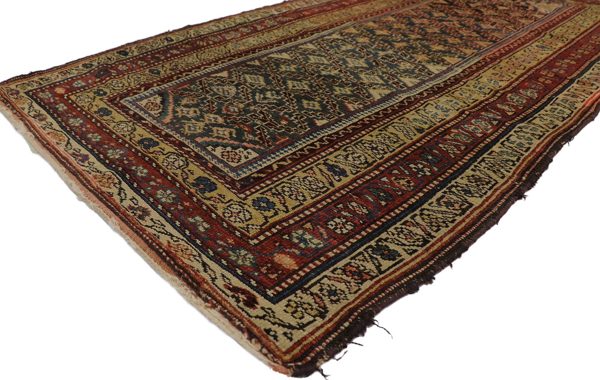 21691 antique Caucasian Shirvan rug with Tribal style 04'04 x 07'07. Give the look of woven wonders and nomadic charm with this hand-knotted wool antique Caucasian Shirvan rug. The abrashed navy blue field features an all-over geometric lozenge
