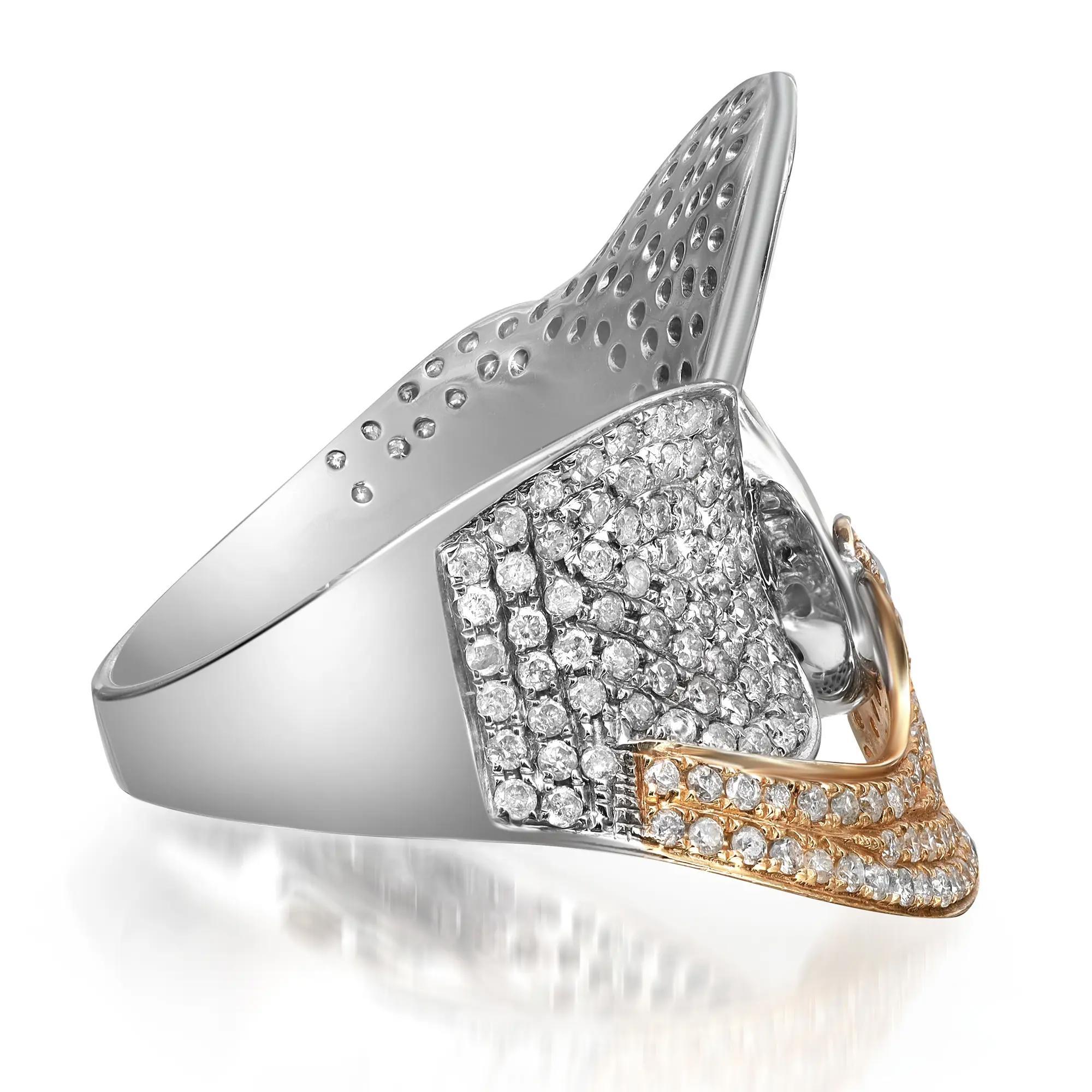This stunning two tone cocktail ring comes with a flashy statement look. A must have in your jewelry collection. The ring is crafted in 14K white and yellow gold. Showcases pave set shimmering round cut diamonds weighing 2.16 carats. Diamond color I