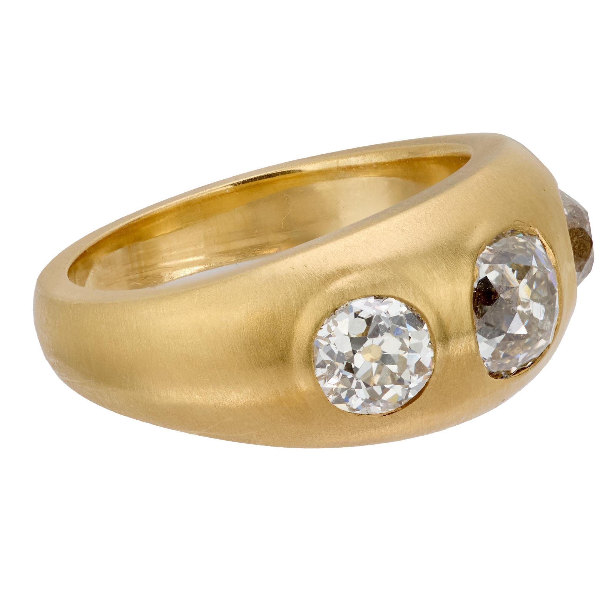 Contemporary 2.17 carat old mine cut diamond matte 18k gold three stone band For Sale