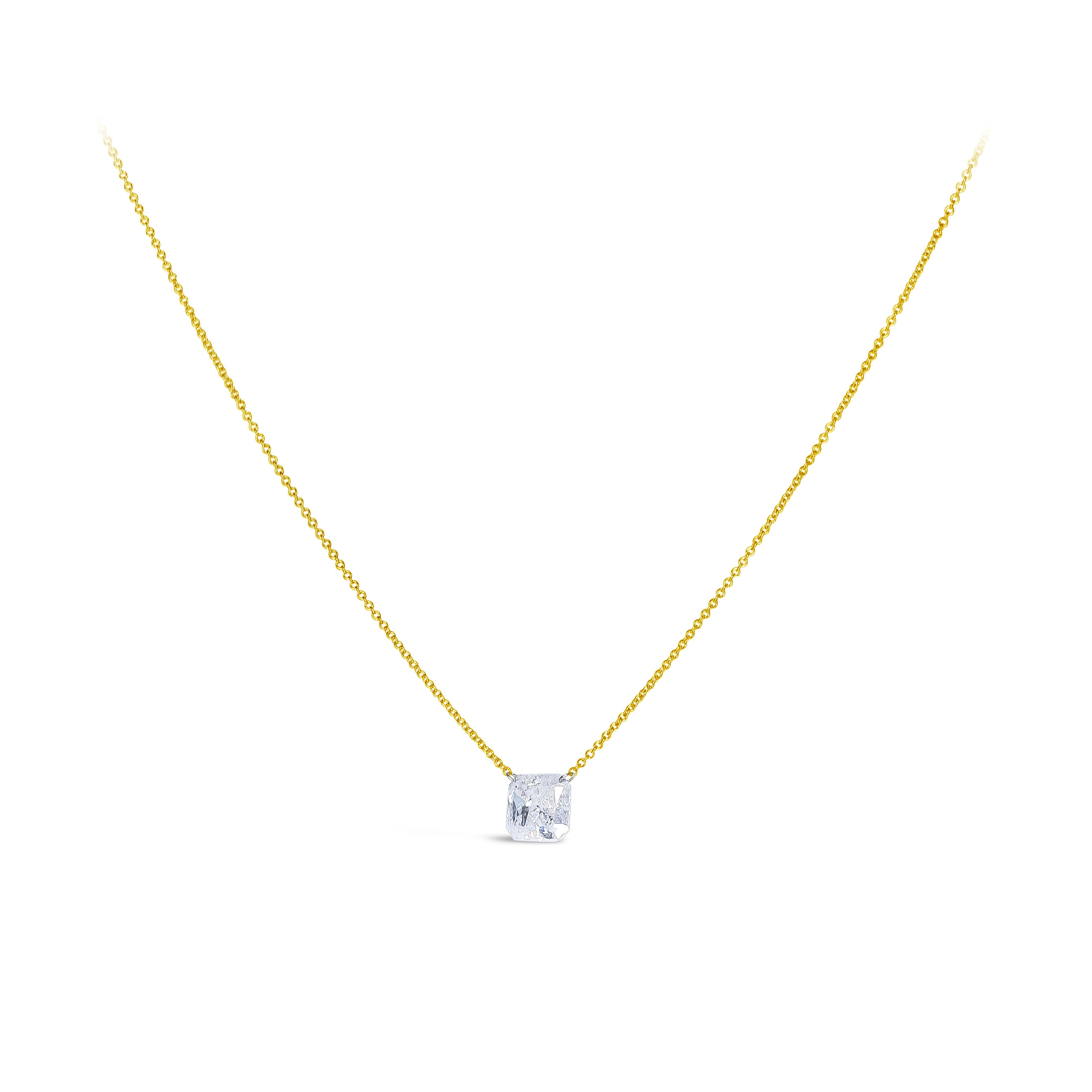 A classic solitaire necklace, showcasing a 2.17 carat radiant cut diamond.  Salt & pepper quality but mainly salt, drilled and attached to an 18K yellow gold chain, 18 inches in length. Perfect for everyday wear. 

Roman Malakov is a custom house,