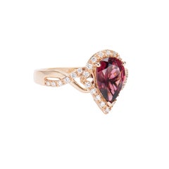 Sunita Nahata Rhodolite 2.17ct. Cocktail Ring in 18KRG with White Diamond.