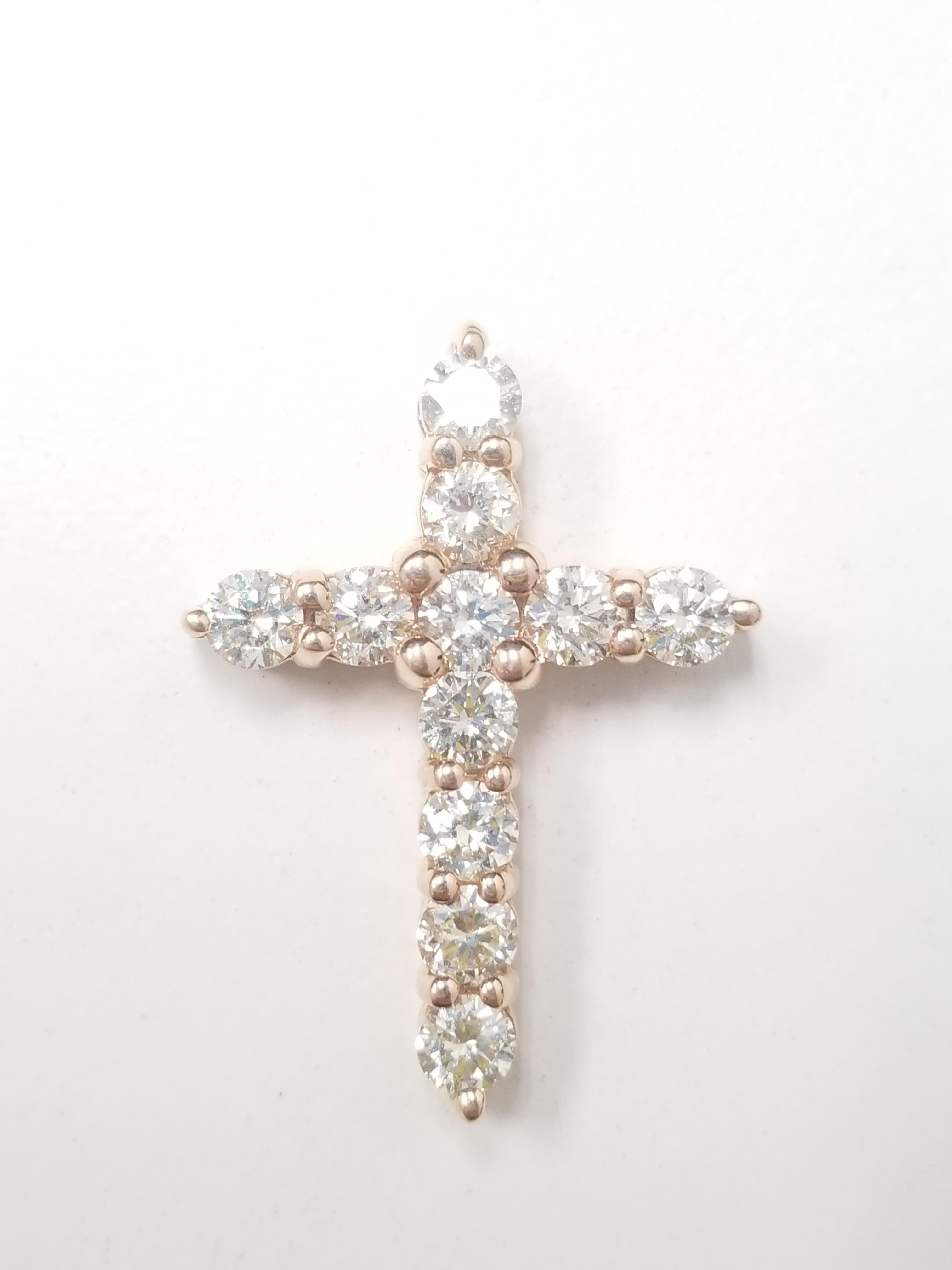 Beautiful 14K Rose gold and diamond cross pendant. A total weight of 2.15 Carat round cut diamonds very sparkly and shiny look. 

(Pendant Only)