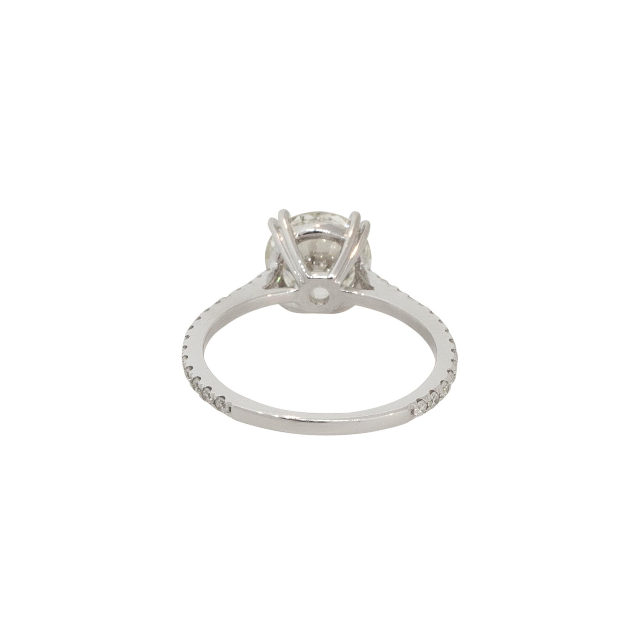 18k White Gold 2.17ctw Round Brilliant Diamond Engagement Ring

Material: 18k White gold
Center Diamond Details: 1.84ct round brilliant EGL graded Diamond. Diamond is L in color and VS1 in clarity. EGL Report # us61844702d
Adjacent Diamond Details: