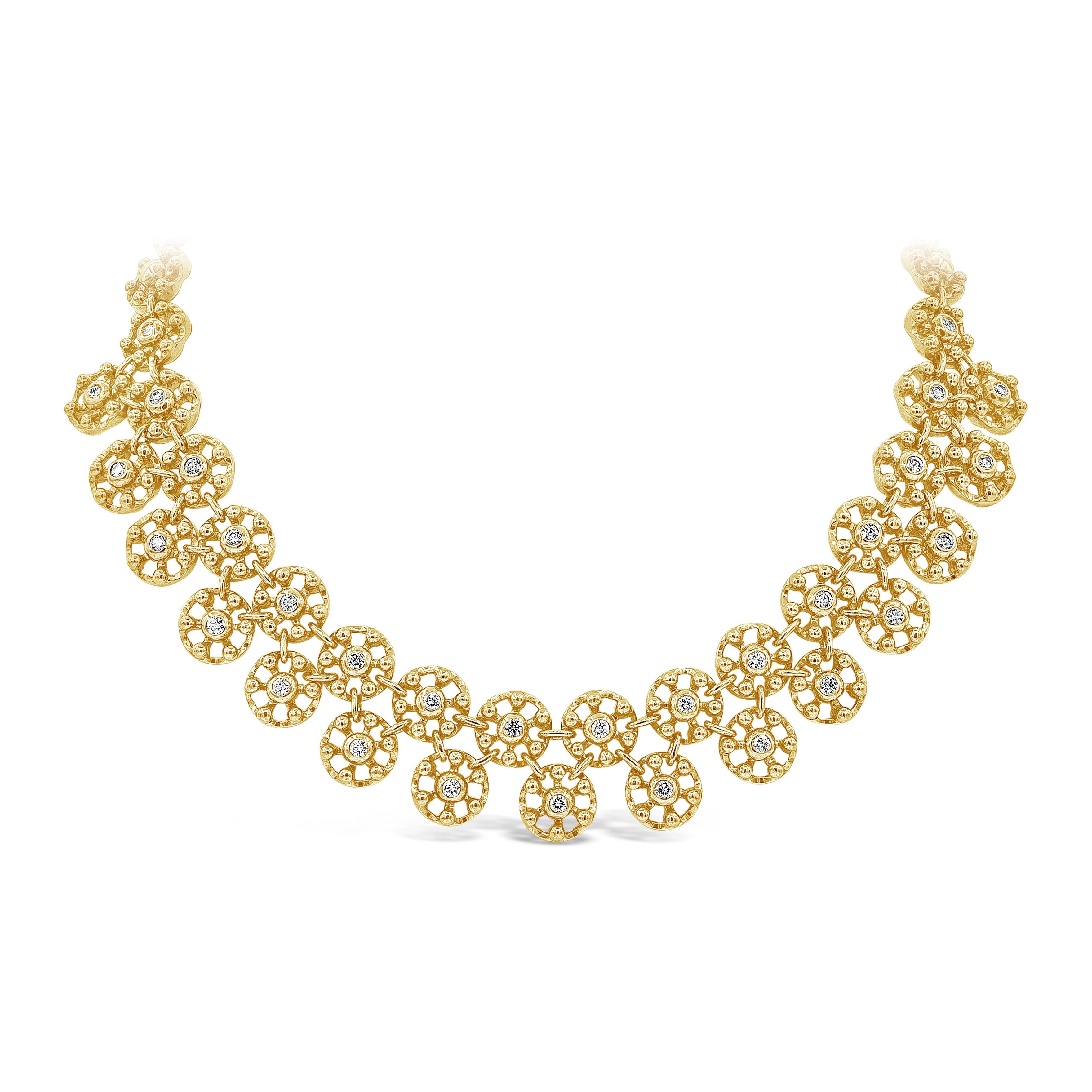 A fashionable and unique necklace showcasing a row of open-work circular designs embedded with round brilliant diamond centers. Diamonds weigh 2.17 carats total and are approximately G color, SI clarity. Made in 18 karat yellow gold.
