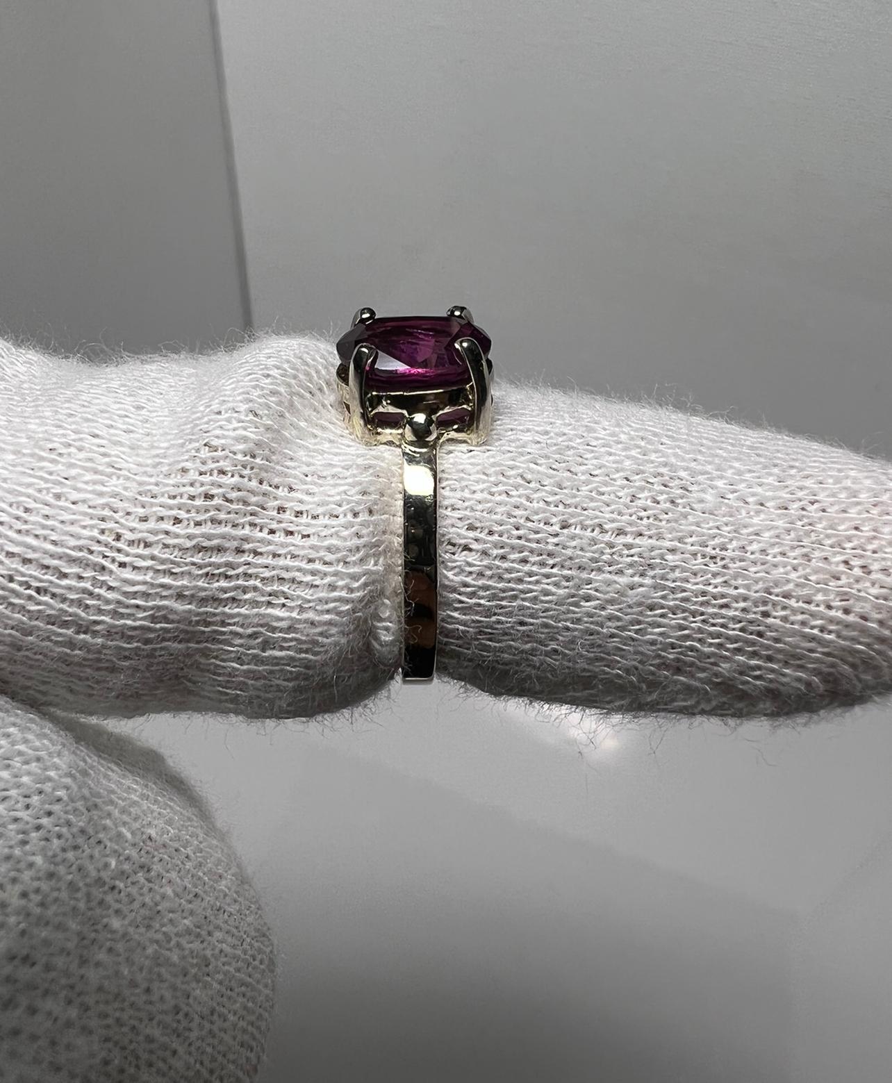 This EyeClean 2.17 Carat Pink Purple Kashmir Sapphire is GIA Certified and has a  very beautiful eye catching color. It’s bright and lively and rare to possess in this clarity and color . It’s a very clean jewel with no inclusions. (Eyeclean) It has