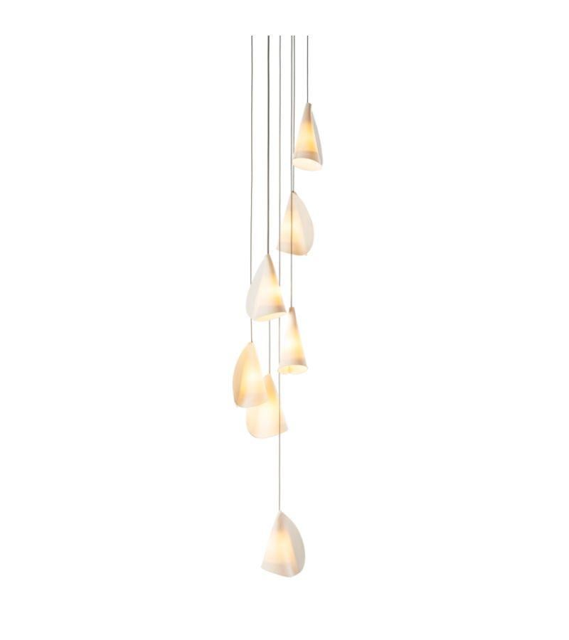 21.7 Porcelain Chandelier lamp by Bocci
Dimensions: Diameter 20.3 x H 300 cm 
Materials: Porcelain, borosilicate glass, braided metal coaxial cable, electrical components, brushed nickel canopy. 
Lamping: 1.5w LED or 20w xenon. Nondimmable.
