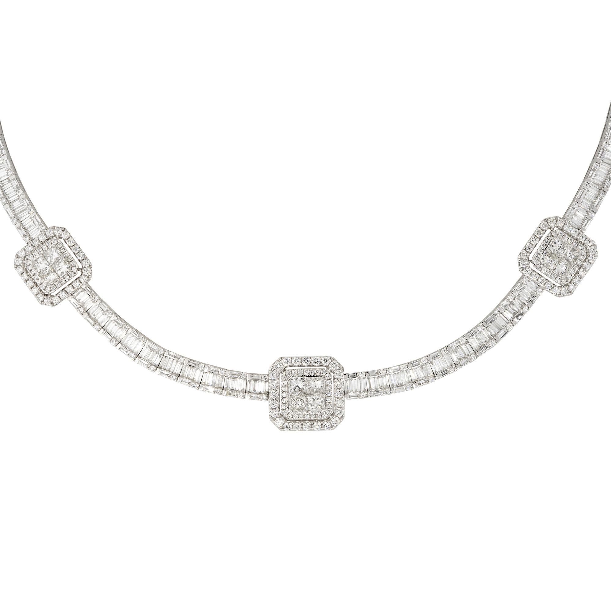 This 18k white gold 21.71ctw baguette, round brilliant, and princess cut diamond station necklace is a luxurious and stunning piece of jewelry. This necklace is made of 18k white gold, which is a type of gold that is mixed with other metal alloys to