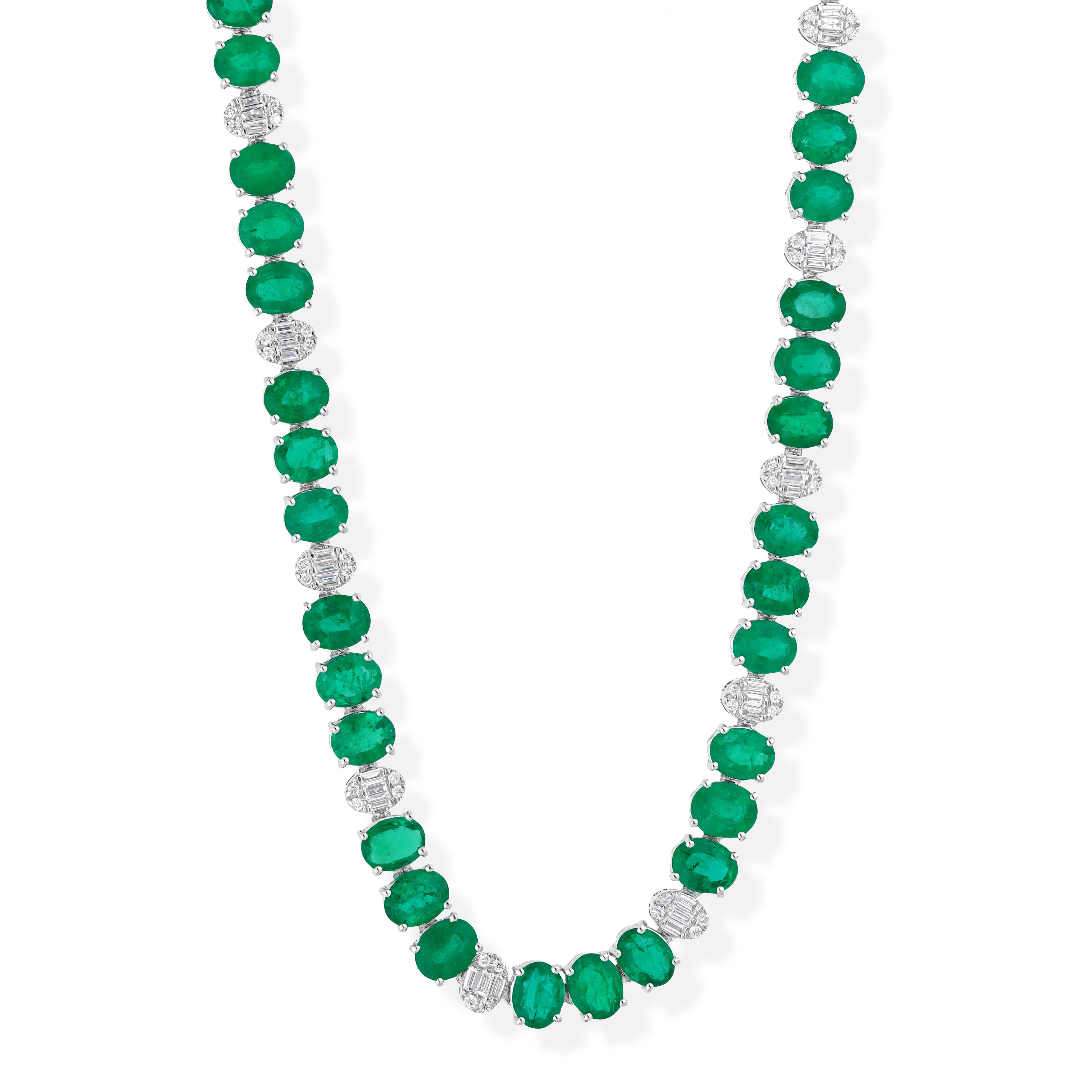 Cast from 18-karat gold, these exquisite necklace is handset with 21.74 carats Zambian emerald and 1.27 carats of sparkling diamonds.

FOLLOW SPECTRUM JEWELS storefront to view the latest collection & exclusive pieces. Spectrum Jewels is proudly