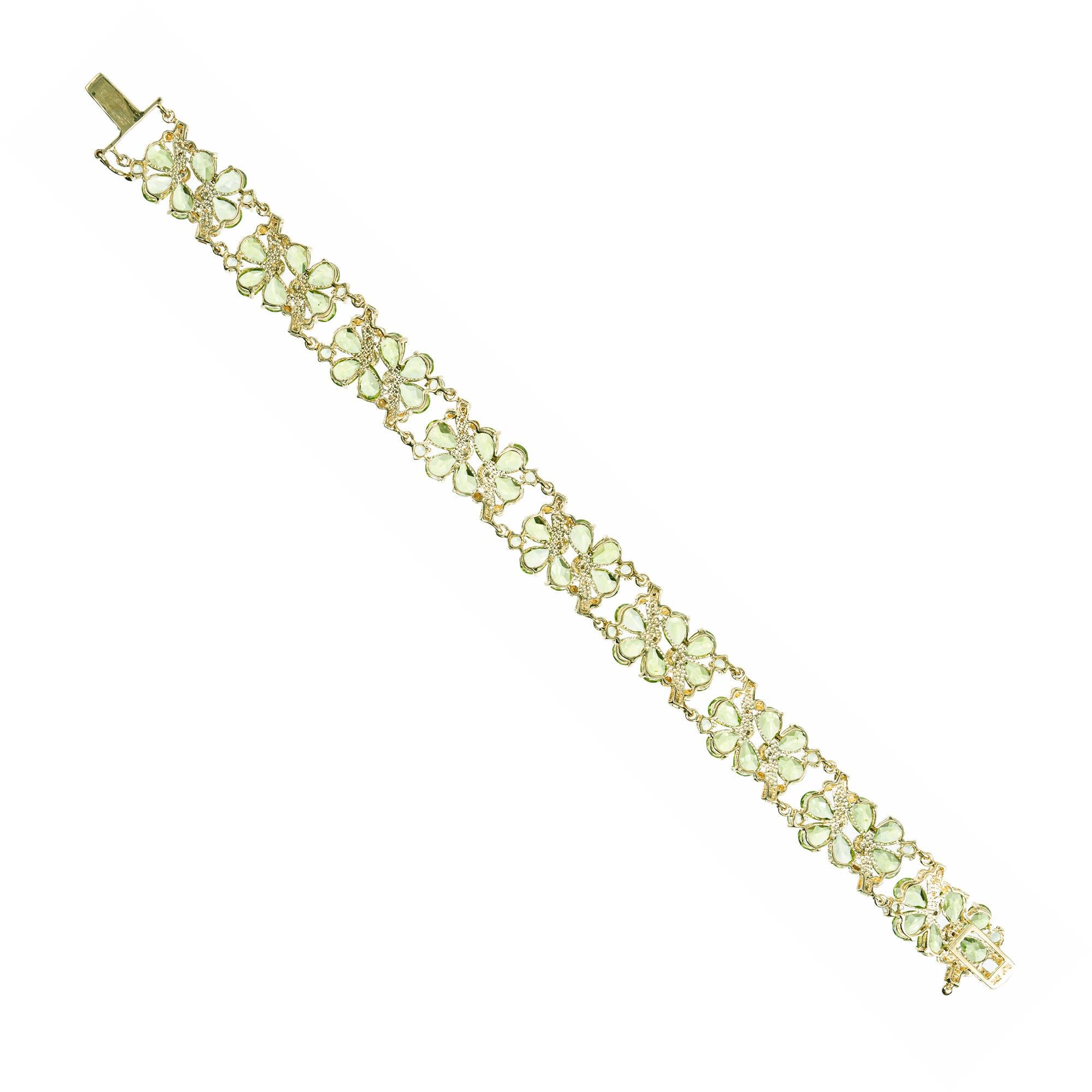 Pear Cut 21.75 Carat Peridot Diamond Yellow Gold Flower Bracelet  For Sale